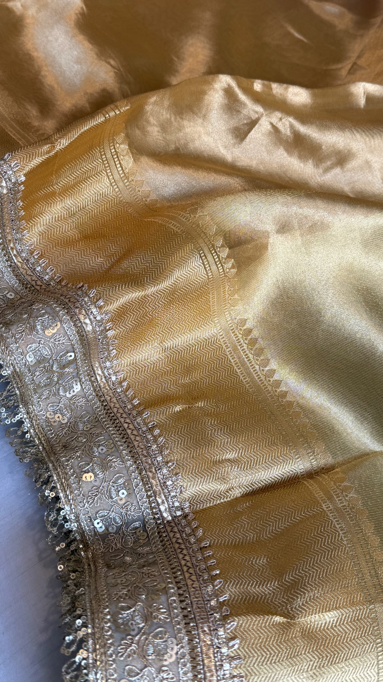 Earthy shades of rang birangi maharani tissue silk kadhwa saree