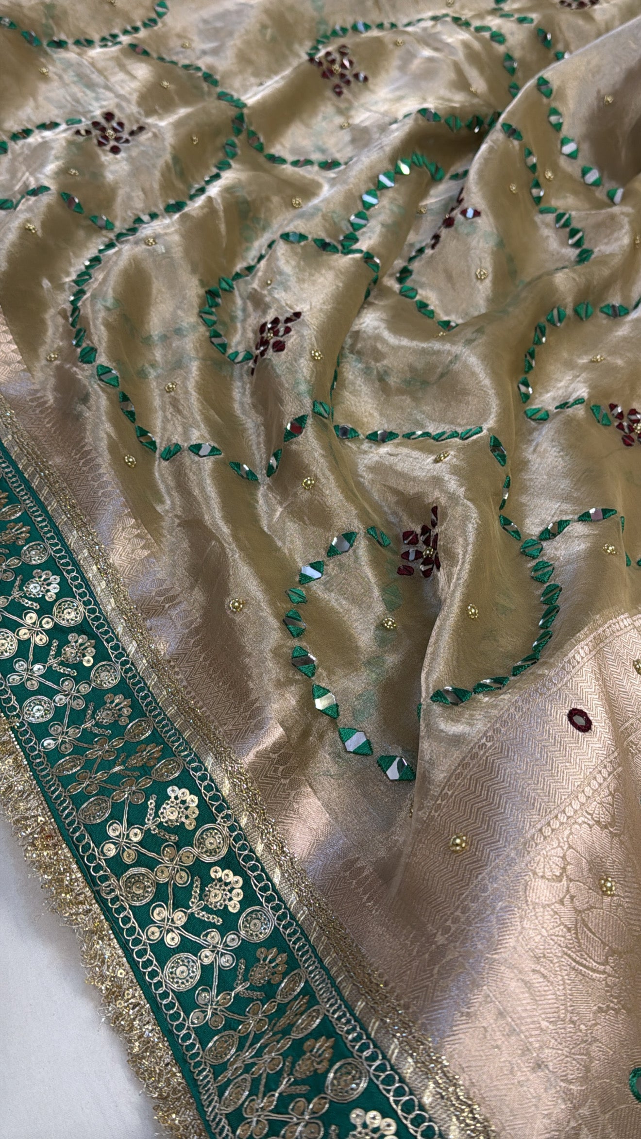 Champagne gold with green mirror work husn tissue silk hand embroidered kadhwa saree