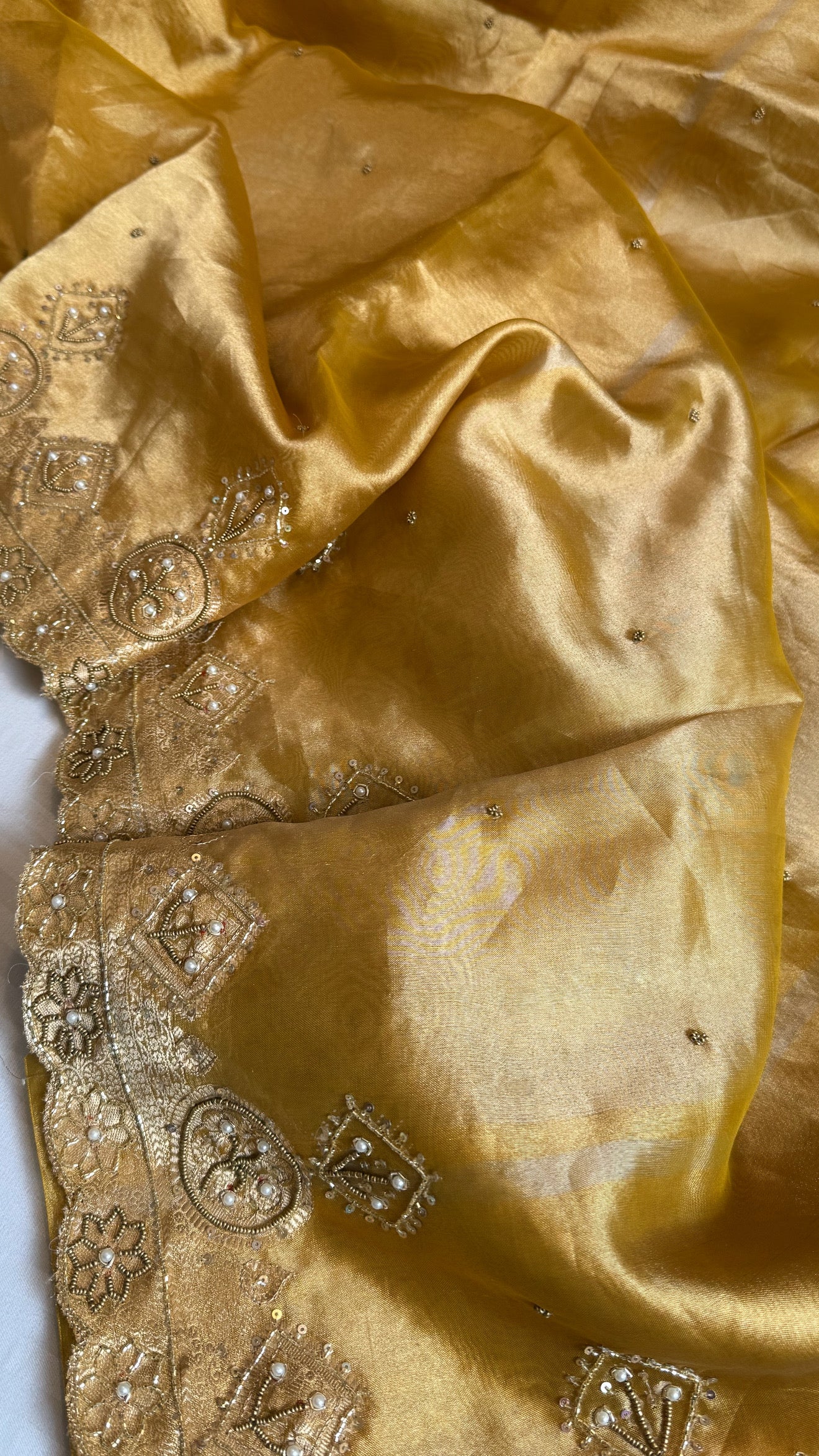 Husn golden yellow tissue silk heavy zardozi hand embroidered saree