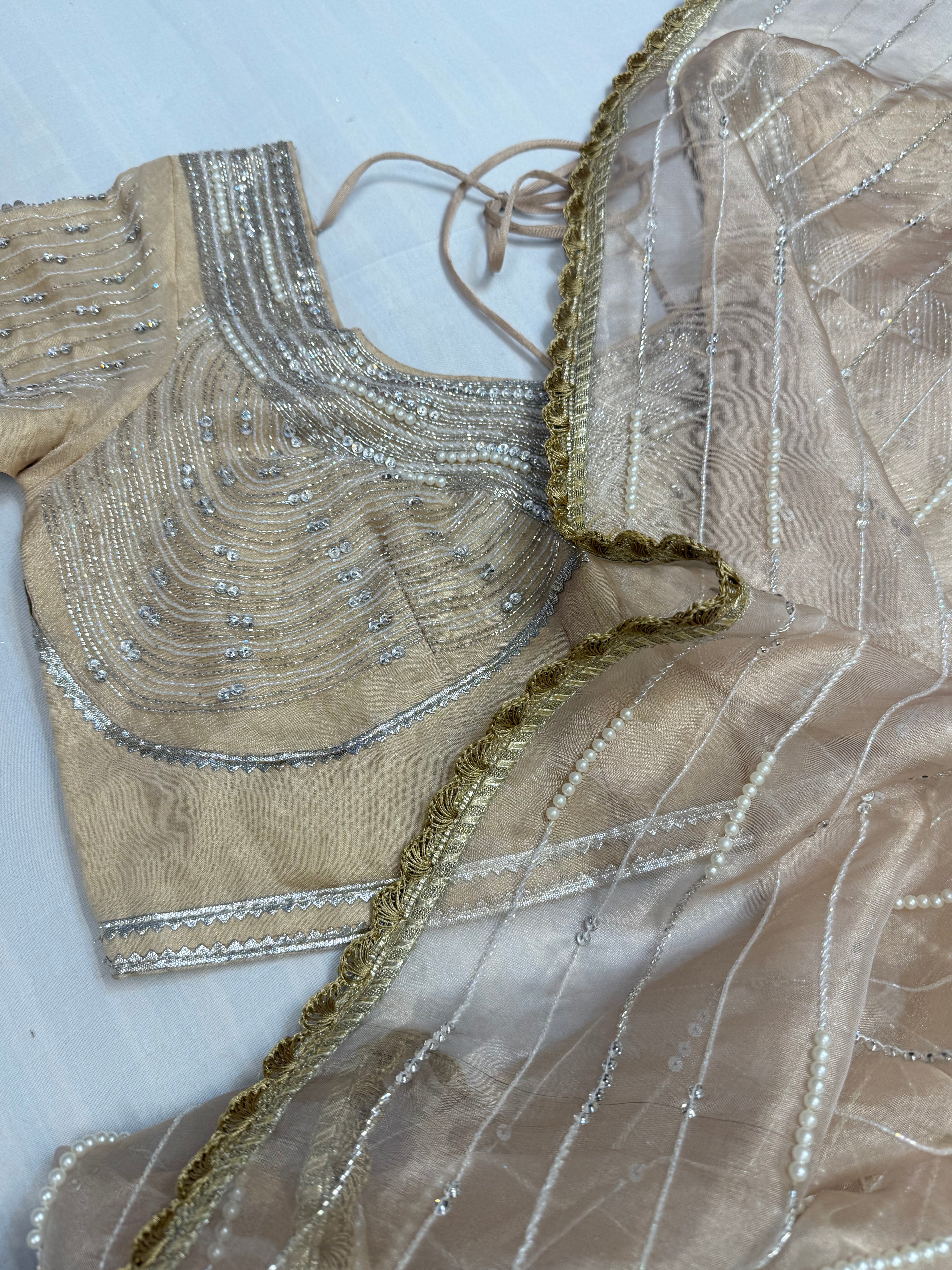 Suhana khan inspired golden pearl work heavy hand embroidered tissue silk saree