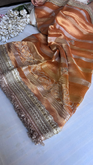 Husn fanta orange tissue silk saree