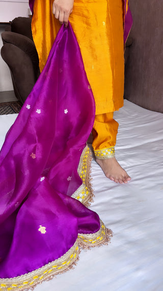 Haldi yellow-purple stitched hand embroidered kadhwa silk suit set from vyaah wala ghar edit