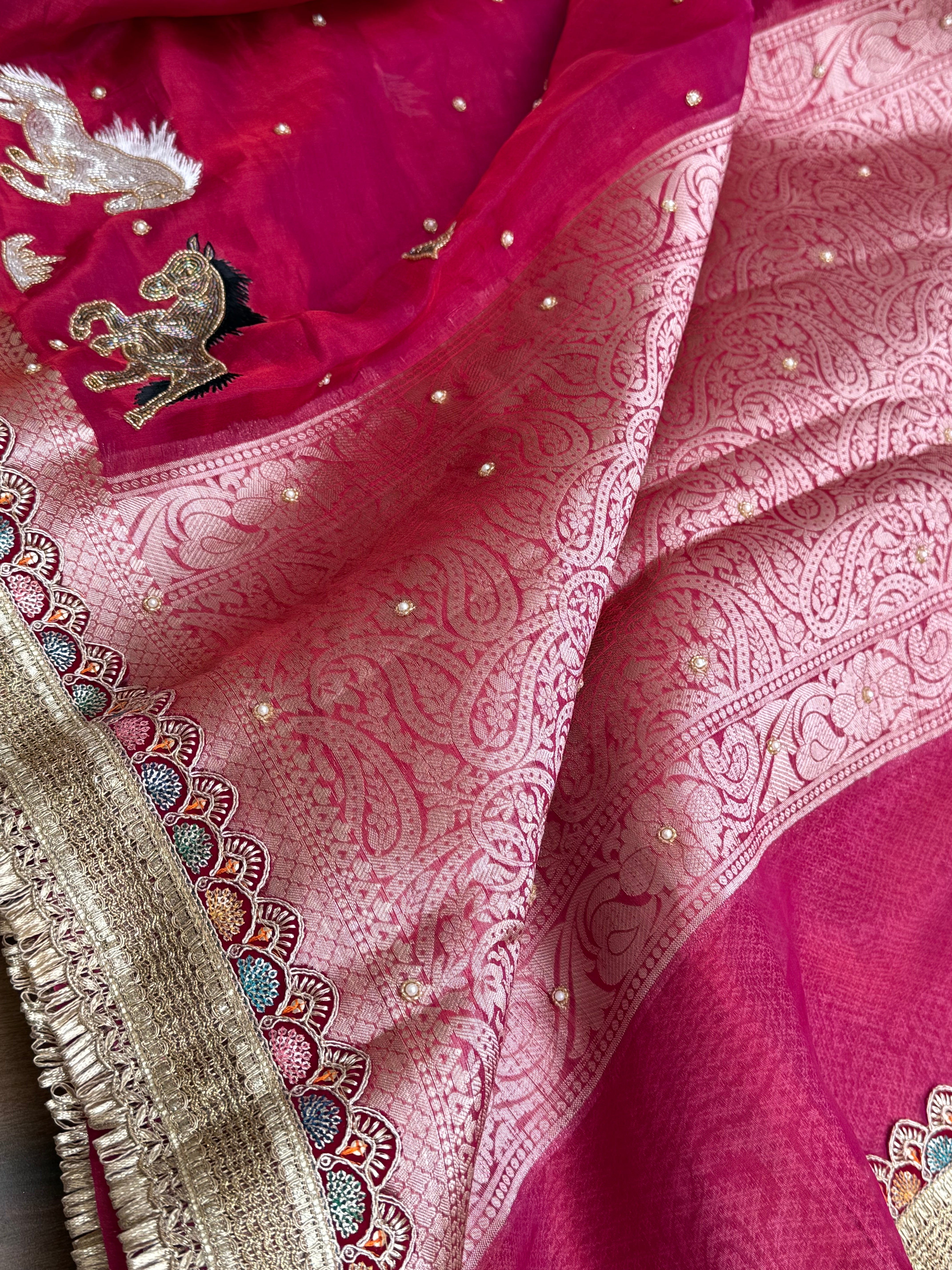 Horse hand embroidered motif cherry pinkish red dhup chao effect tissue silk banarasi gotapatti kadhwa saree