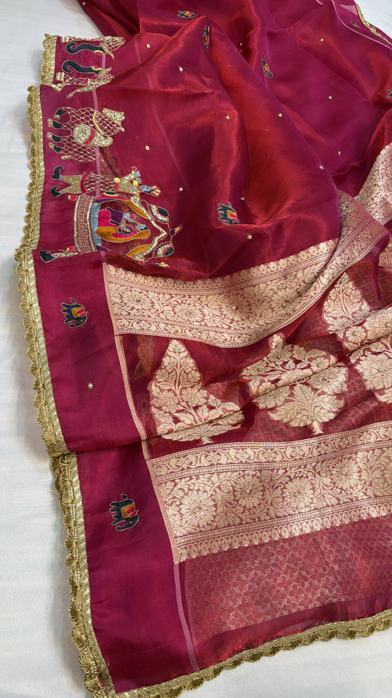 Husn metallic cherry red tissue silk hand embroidered saree