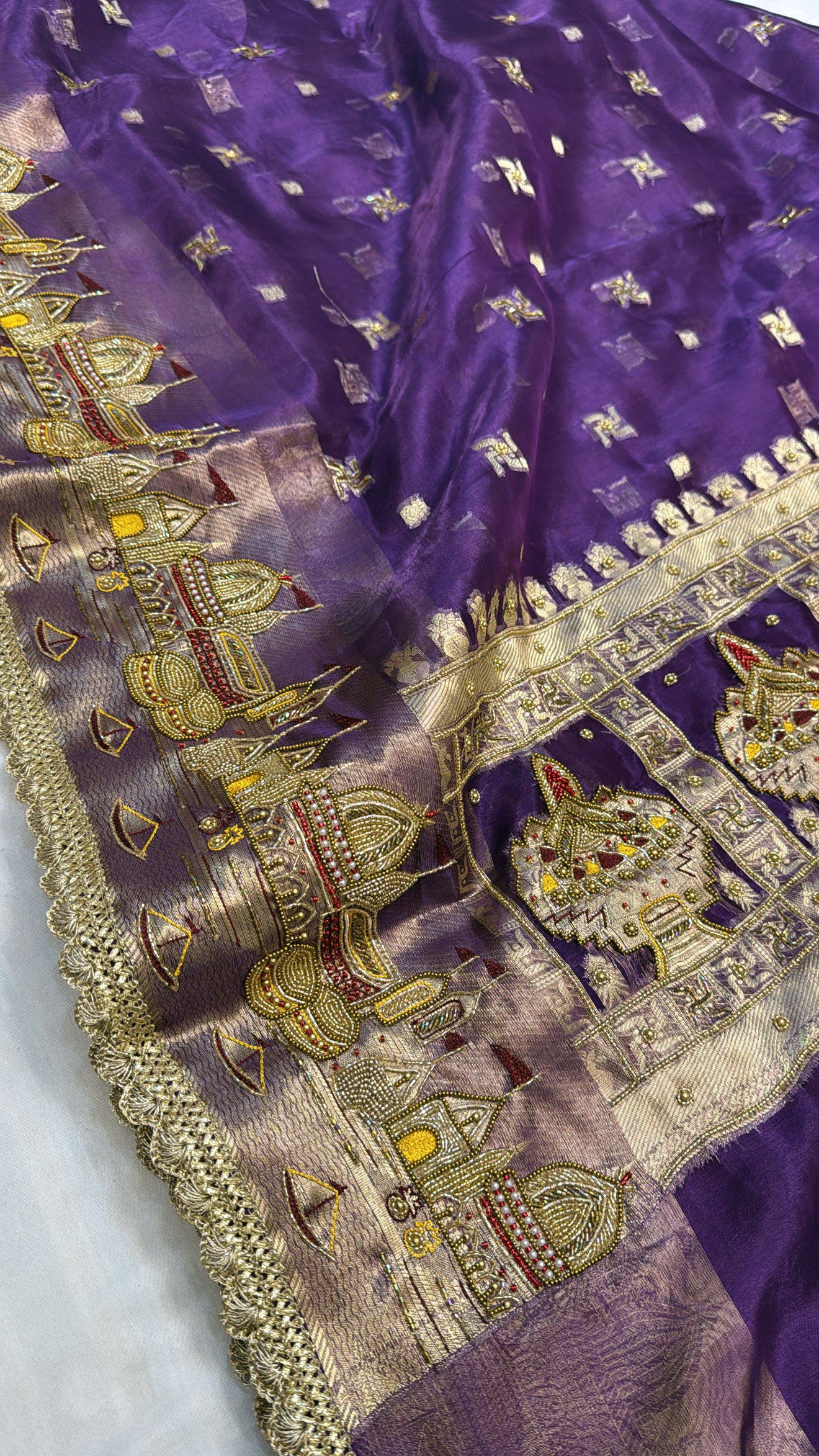 Gangaghat edit midnight purple hand embroidered tissue silk saree