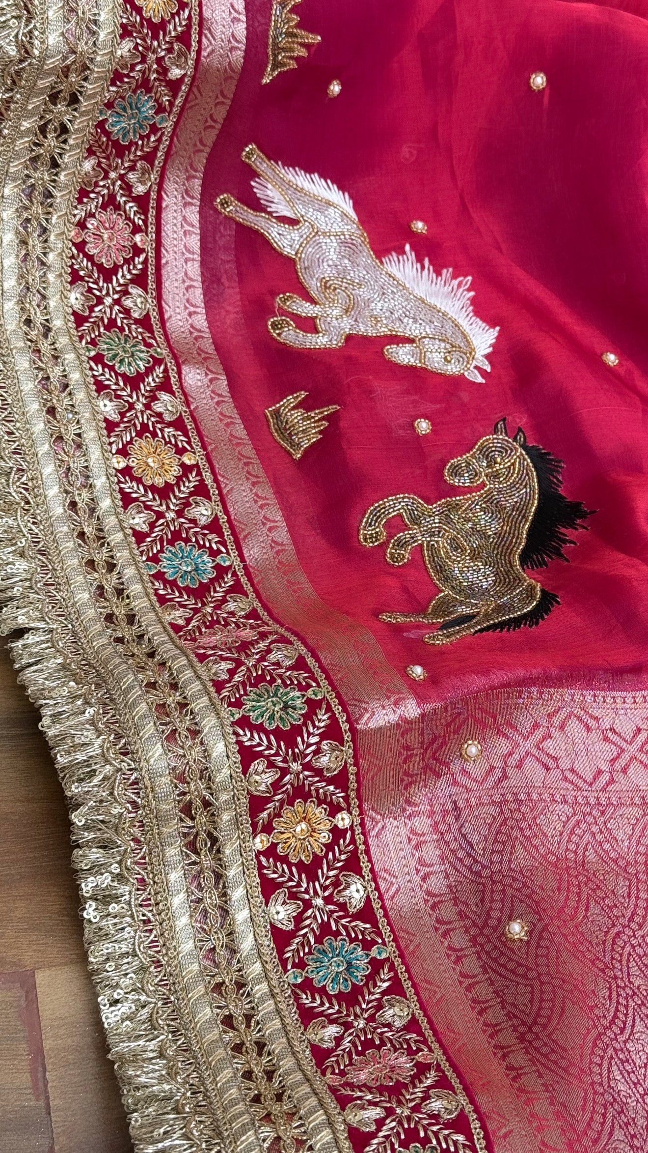Horse hand embroidered motif cherry pinkish red dhup chao effect tissue silk banarasi gotapatti kadhwa saree