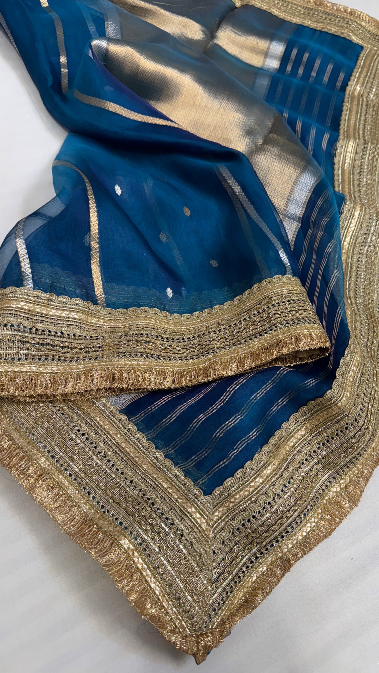 Maharani aqua blue tissue silk kadhwa buti saree