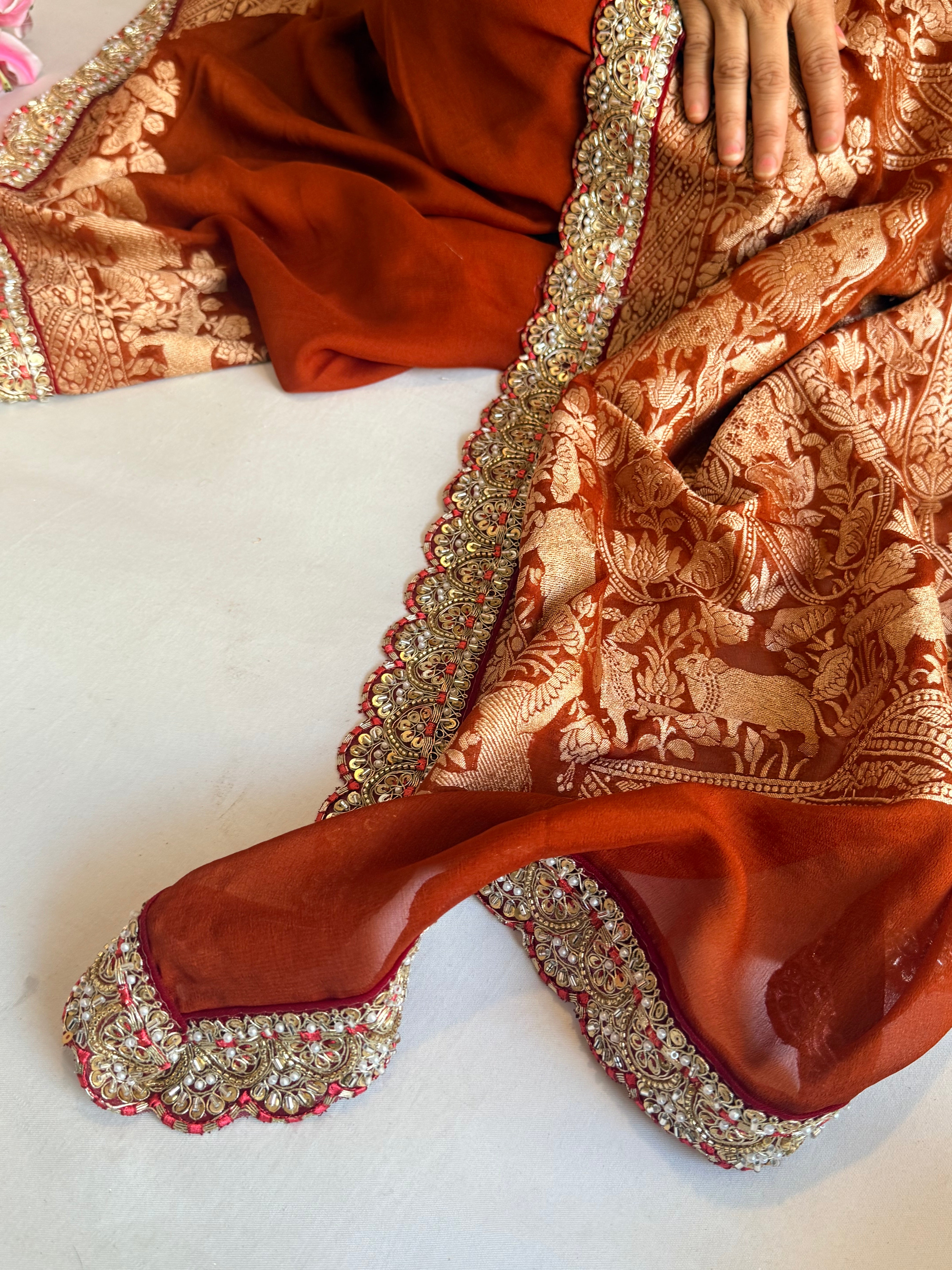 Brick red shikargah kadhwa border chiffon gorgette banarasi saree