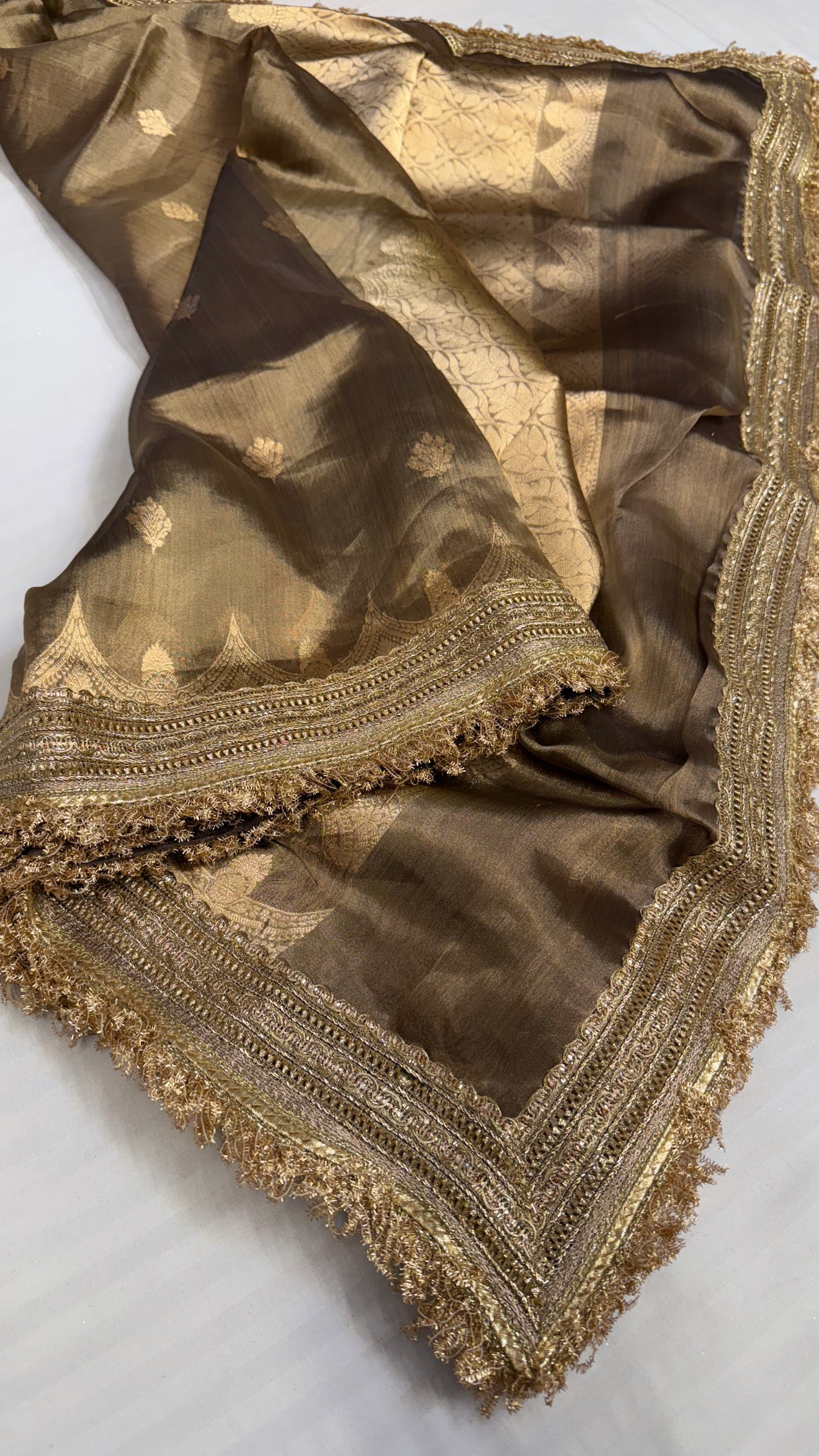 Maharani english gold tissue silk kadhwa buti saree