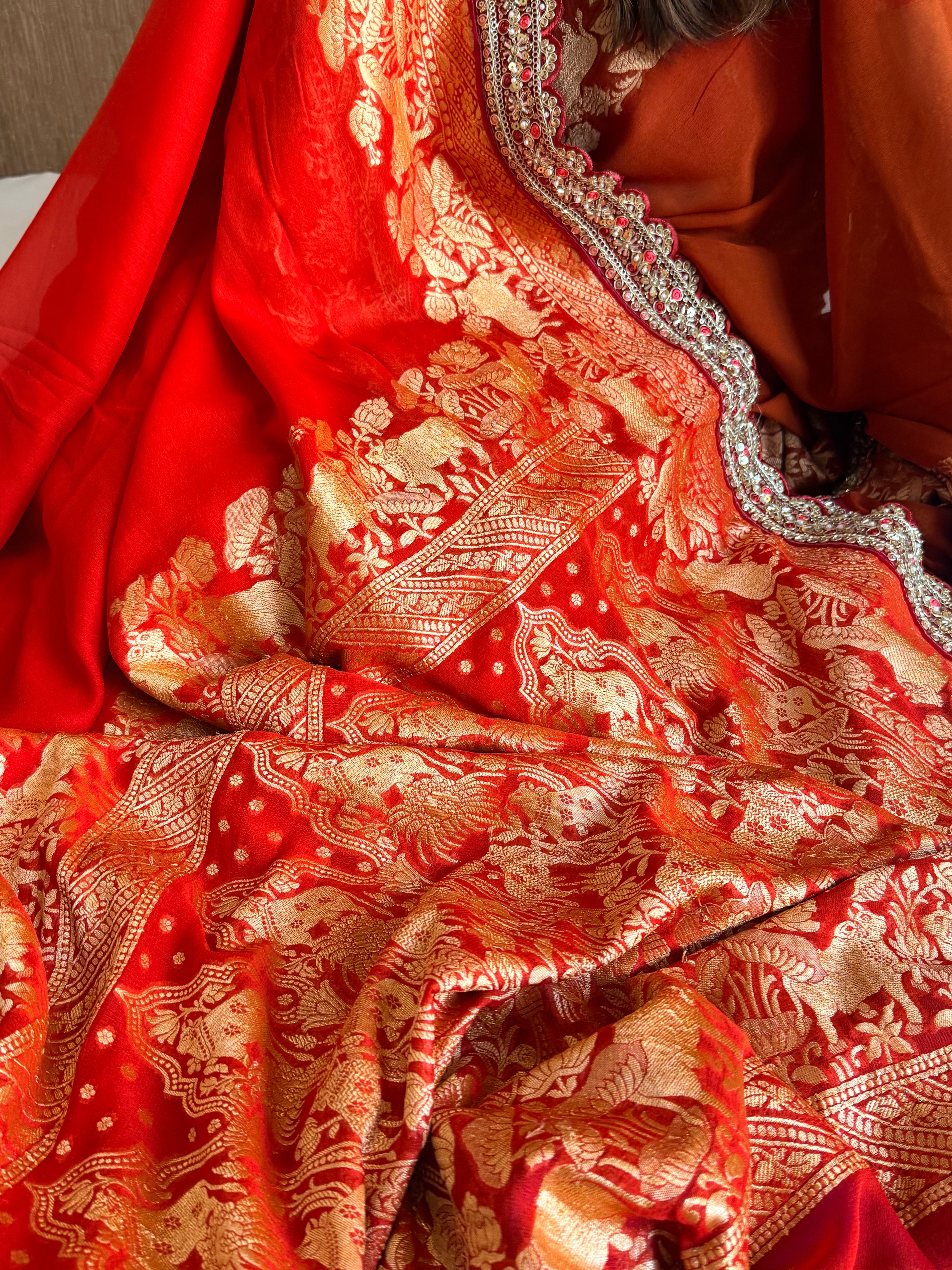 Vermilion red shikargah kadhwa border chiffon gorgette banarasi saree