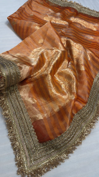 Maharani chuski fanta orange tissue silk striped saree