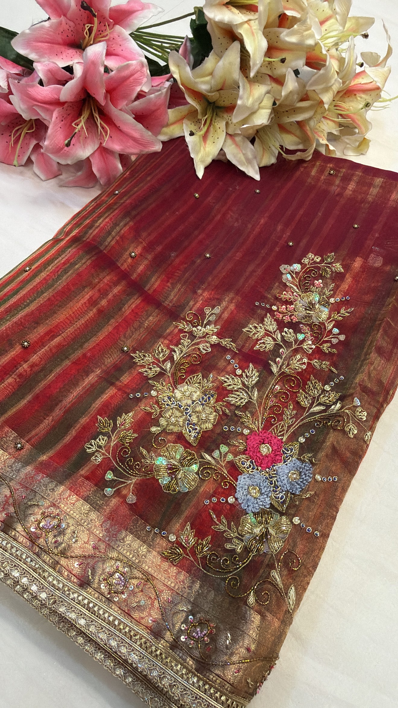 Husn tissue silk multicoloured striped kadhwa hand embroidered saree
