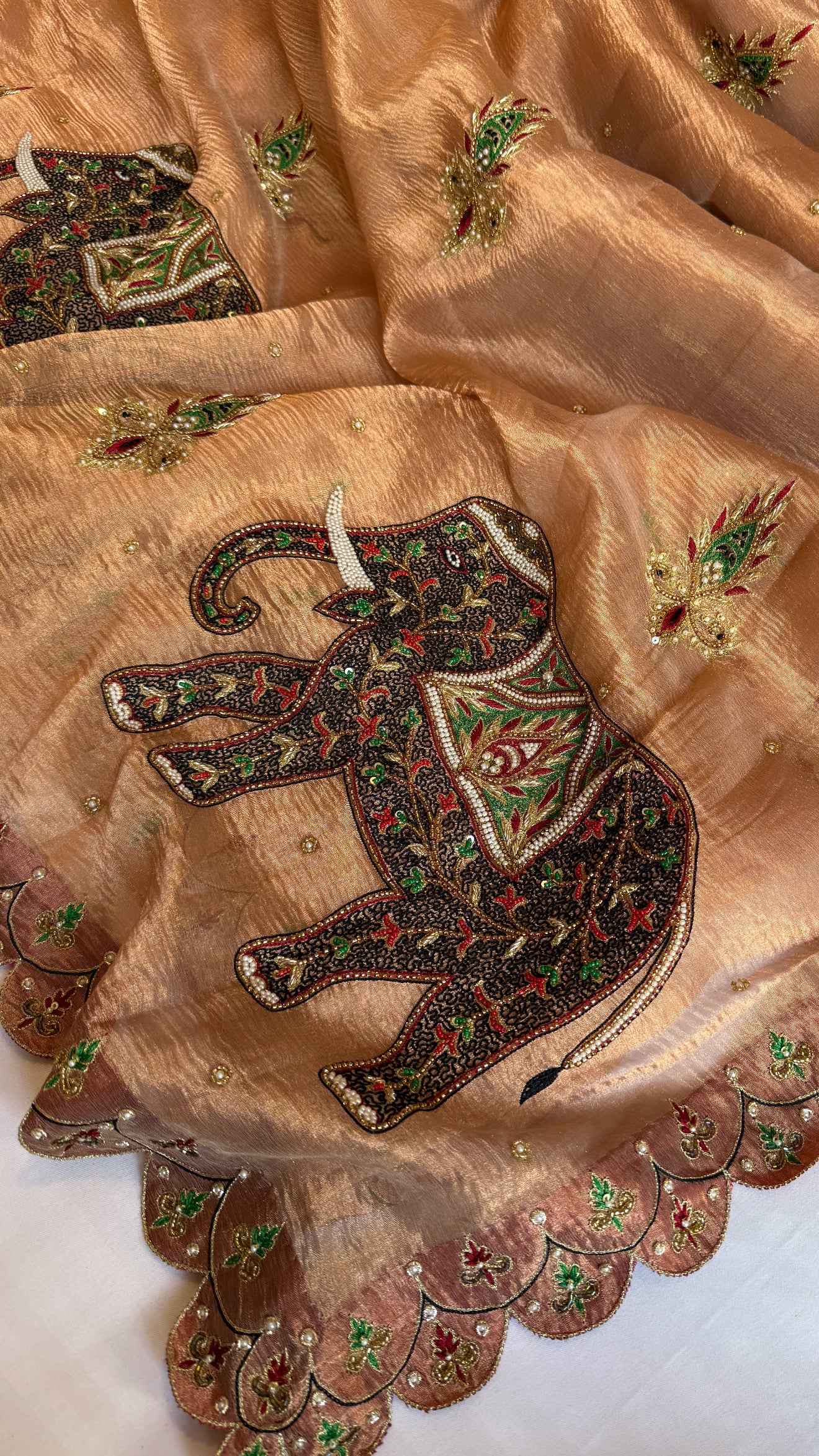 GajGamini copper crushed tissue silk elephant motif heavy hand embroidered saree