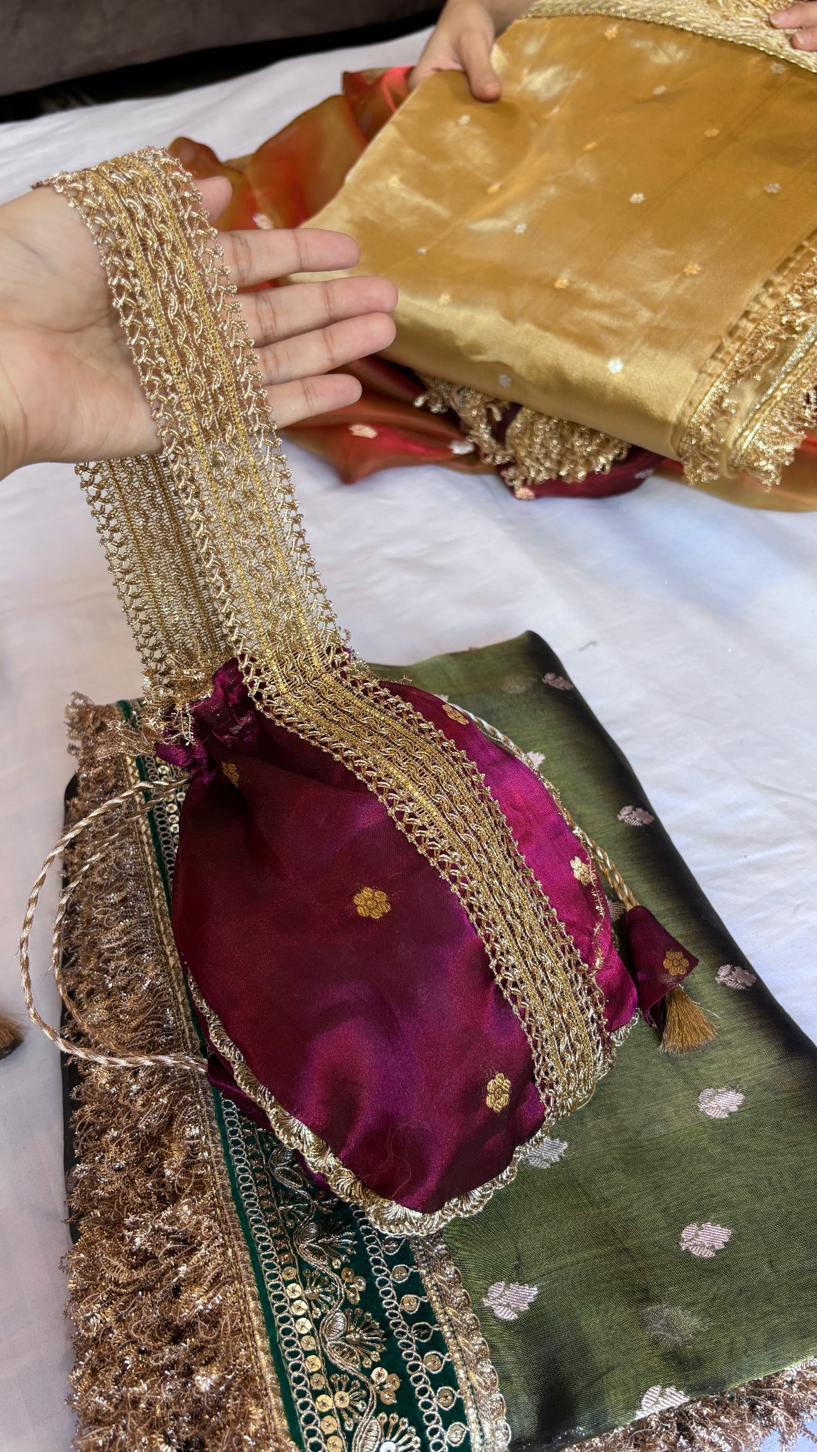Sitara banarasi tissue silk potli bag