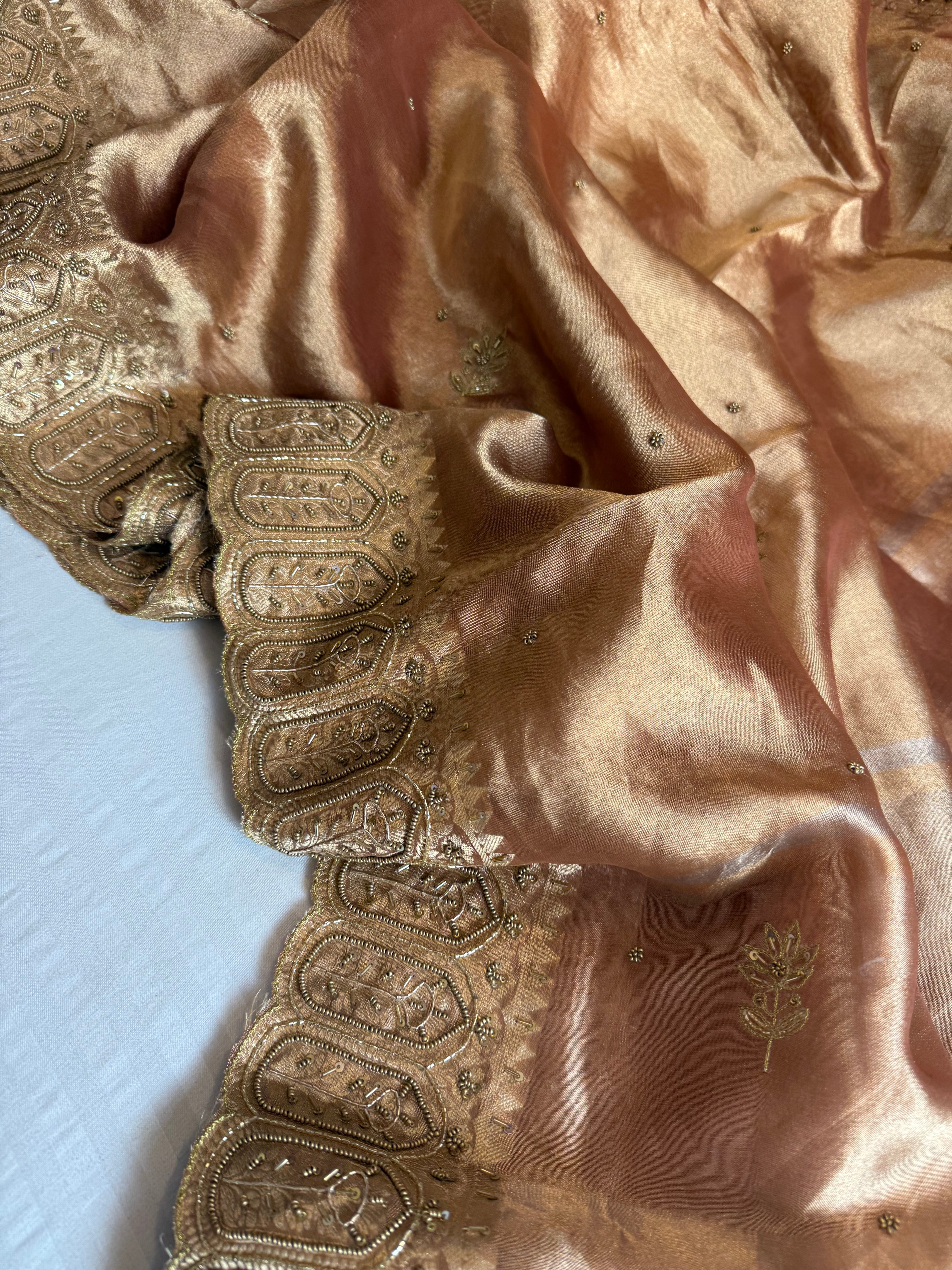Husn kanjivaram peach tissue silk heavy hand embroidered saree