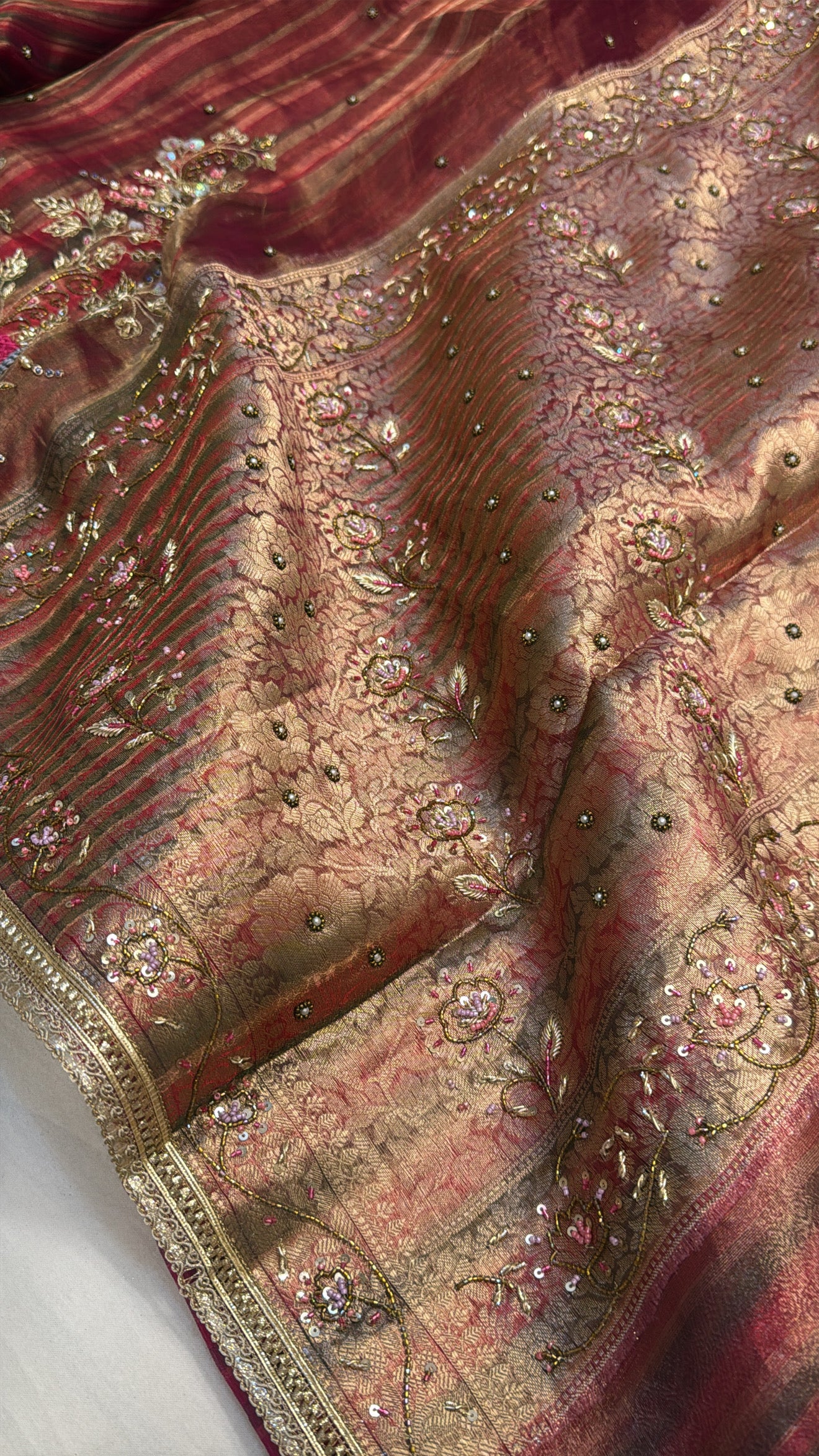 Husn tissue silk multicoloured striped kadhwa hand embroidered saree