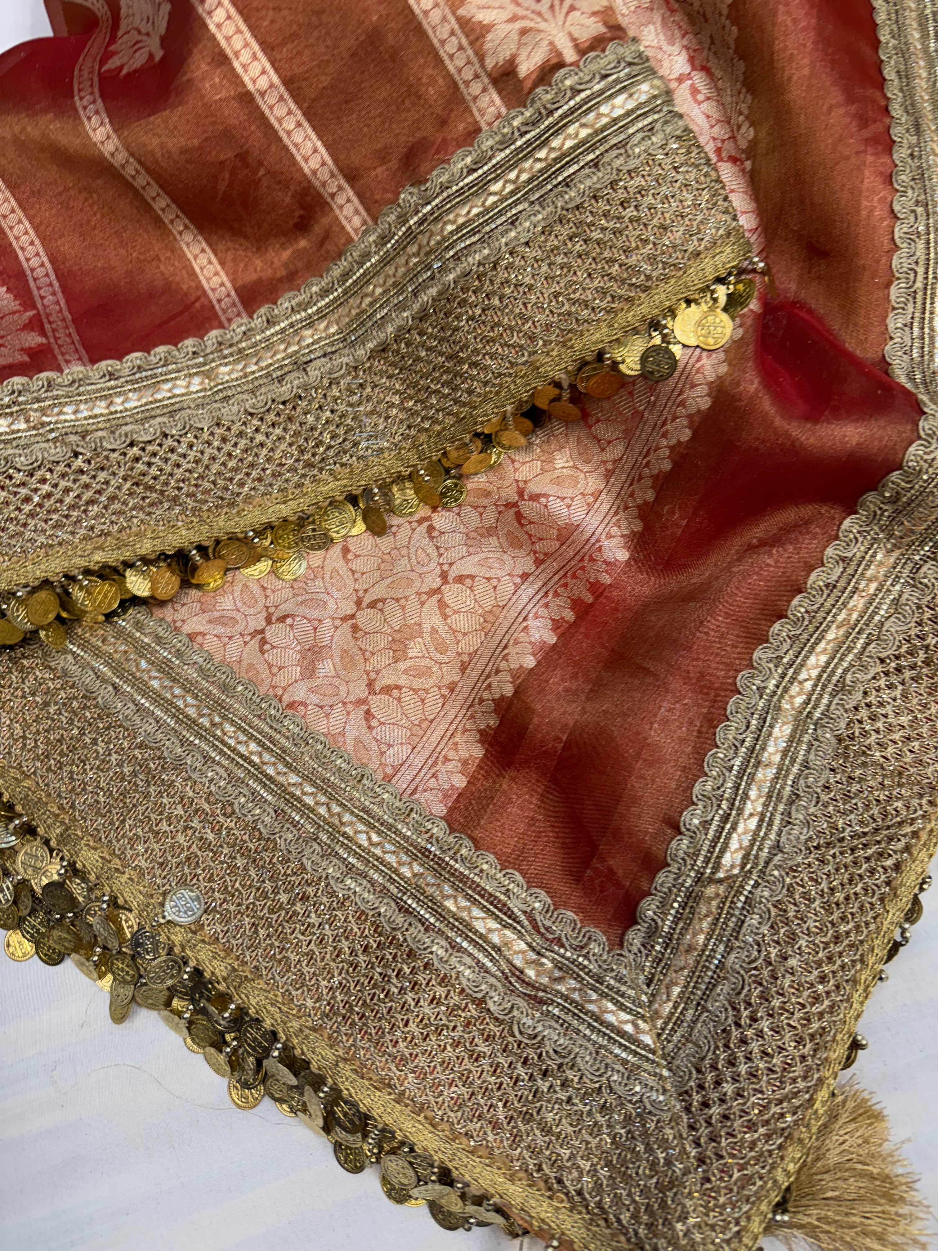 Maroonish red maharani tissue silk kadhwa saree