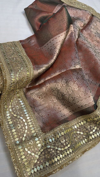 Maharani dusty rose red dhup chao effect tissue silk saree