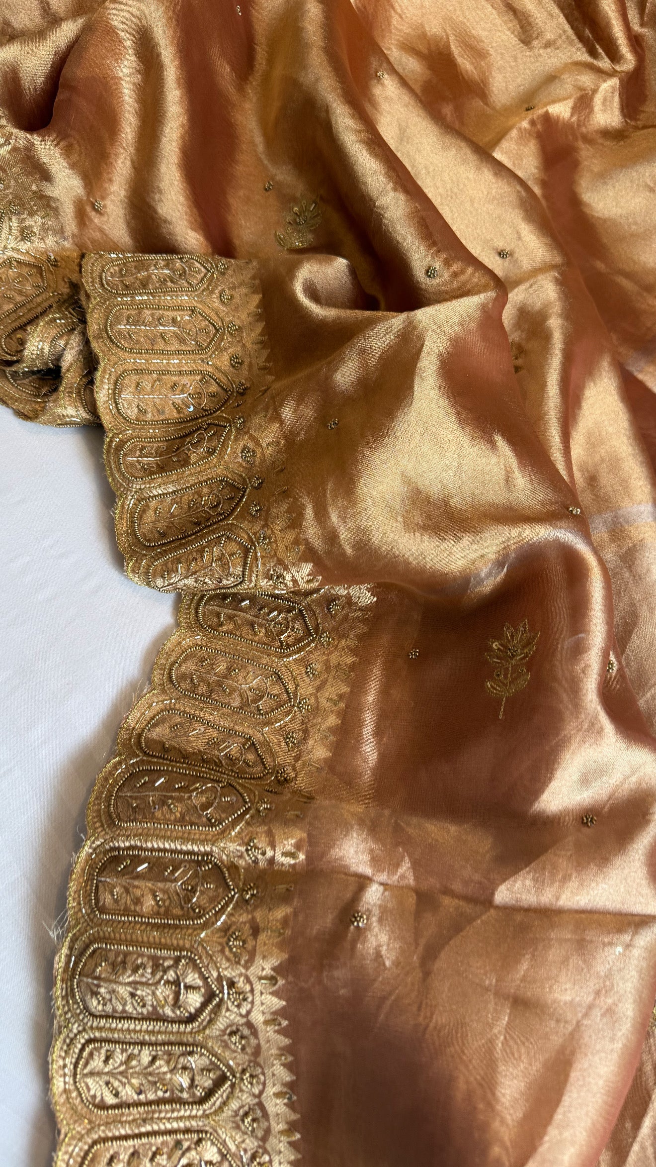 Husn kanjivaram peach tissue silk heavy hand embroidered saree