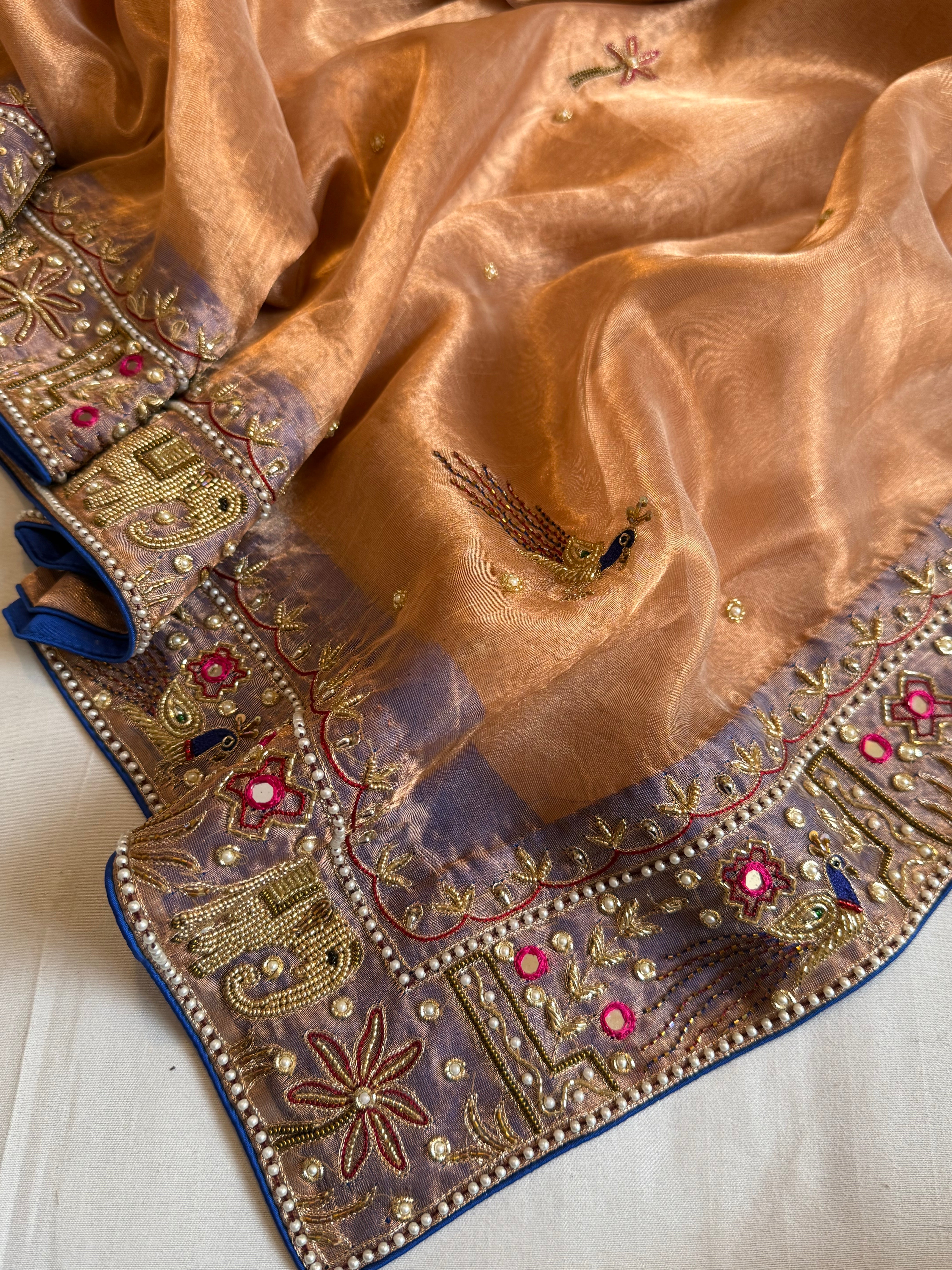 Sheeshmahal shikargah edit - Rose gold tissue silk hand embroidered elephant motif border kadhwa saree