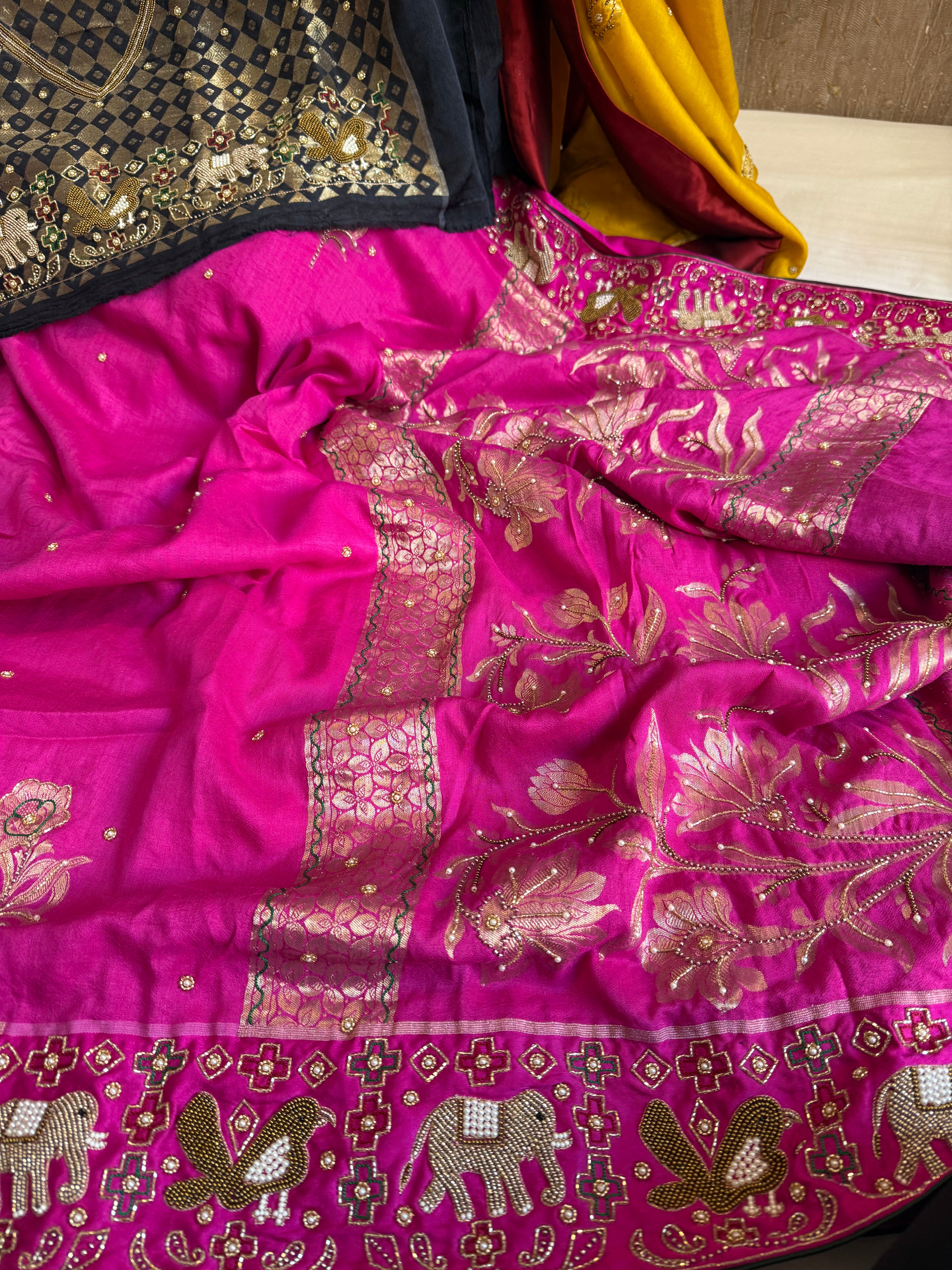 Moonga silk fusion saree with double ikkat patola inspired hand embroidered saree