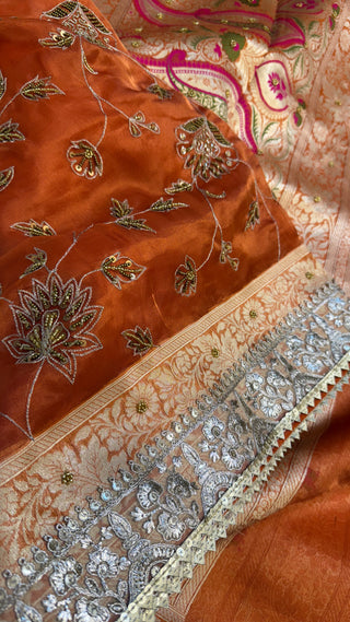 Trousseau edit — Narangi orange tissue silk hand embroidered saree