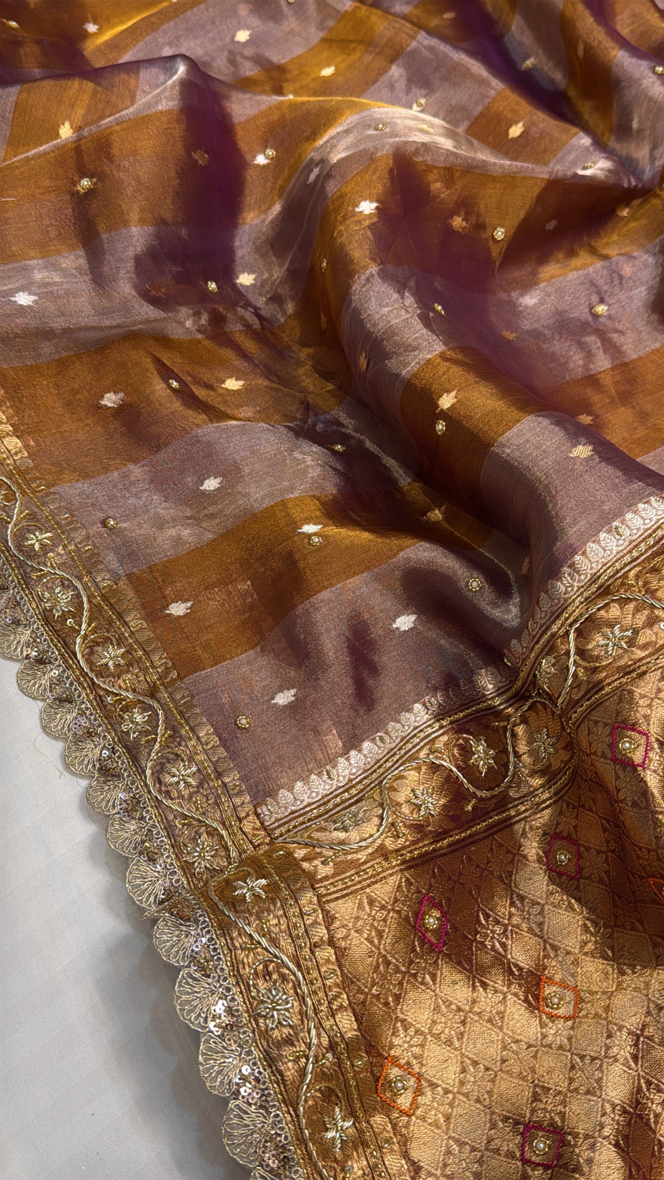 Kanjivaram peach tissue silk striped hand embroidered kadhwa saree