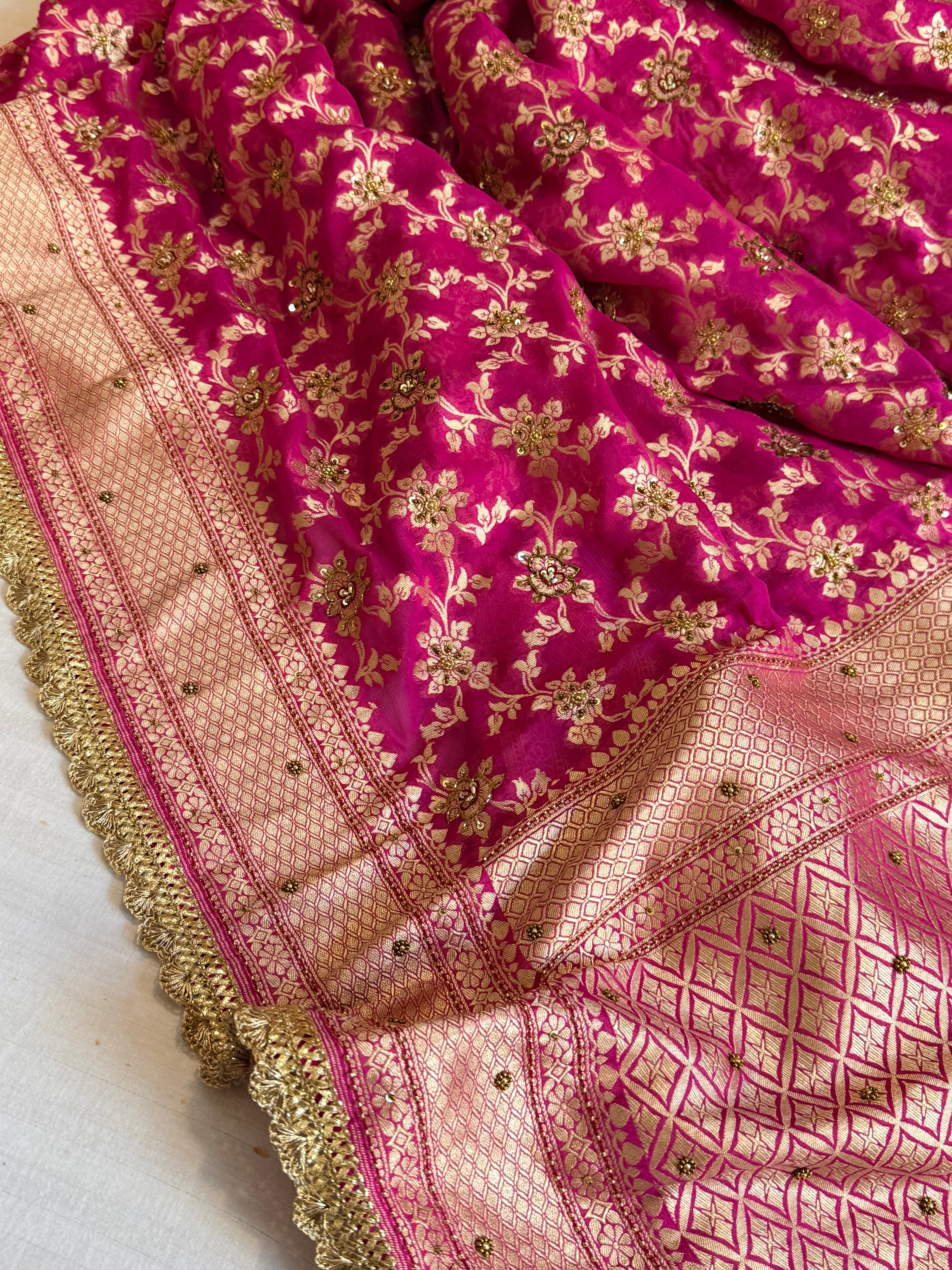 Banarasi chiffon gorgette rani pink hand embroidered kadhwa saree