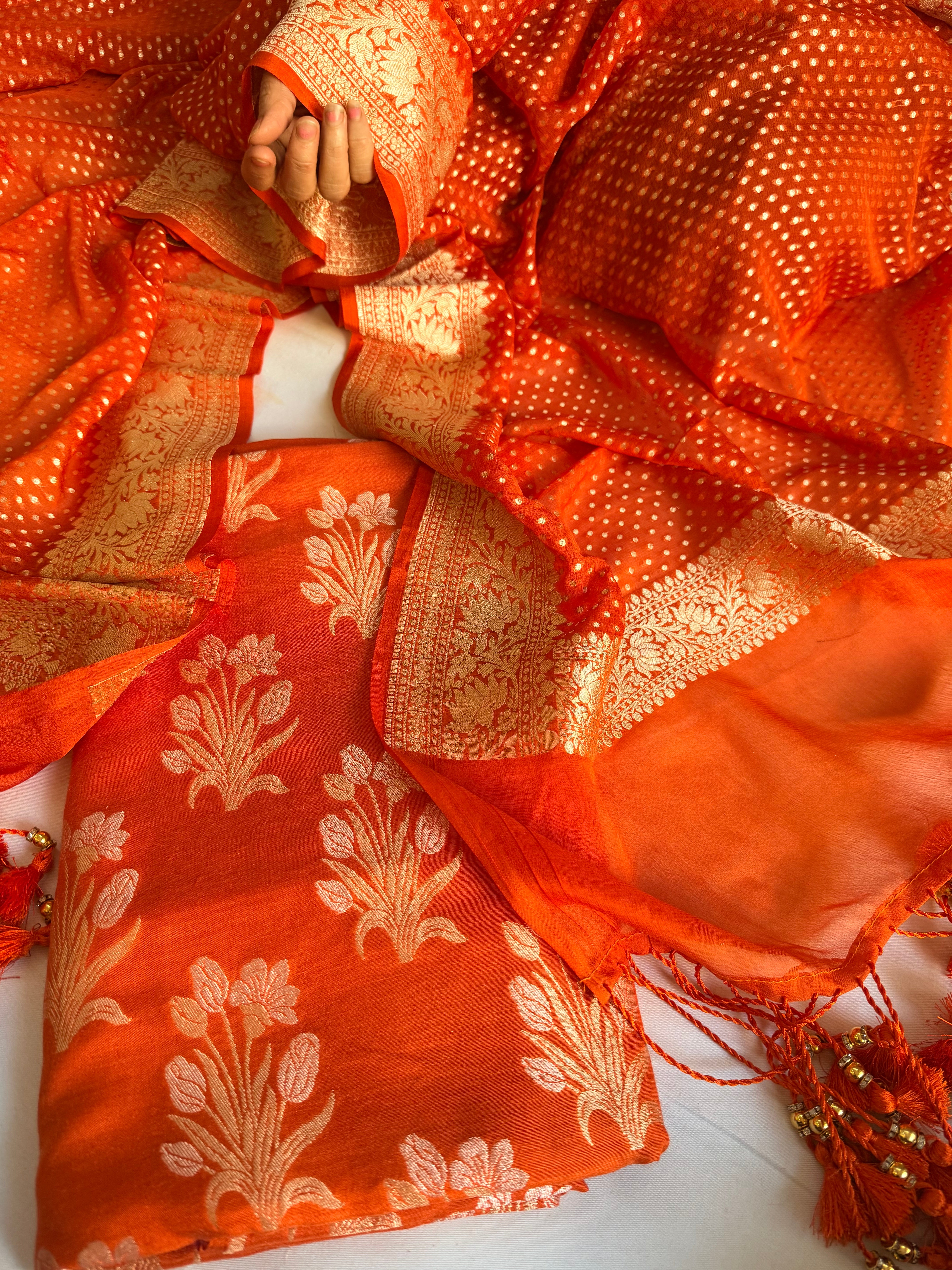 Moonga silk kadhwa kurta paired with gorgette duppata with latkans