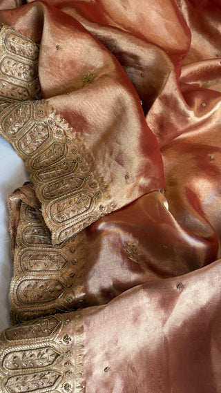 Husn reddish orange tissue silk heavy hand embroidered saree