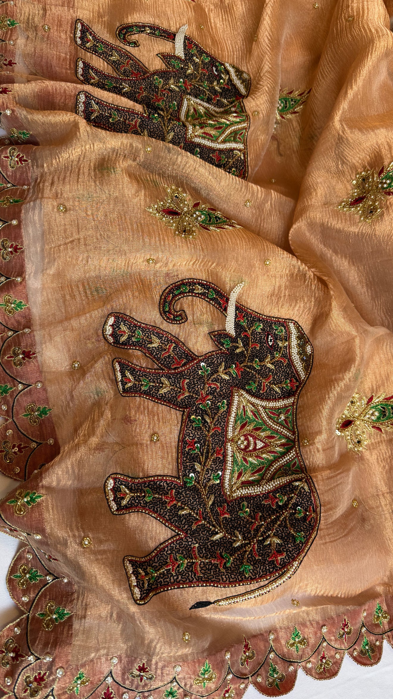 GajGamini copper crushed tissue silk elephant motif heavy hand embroidered saree