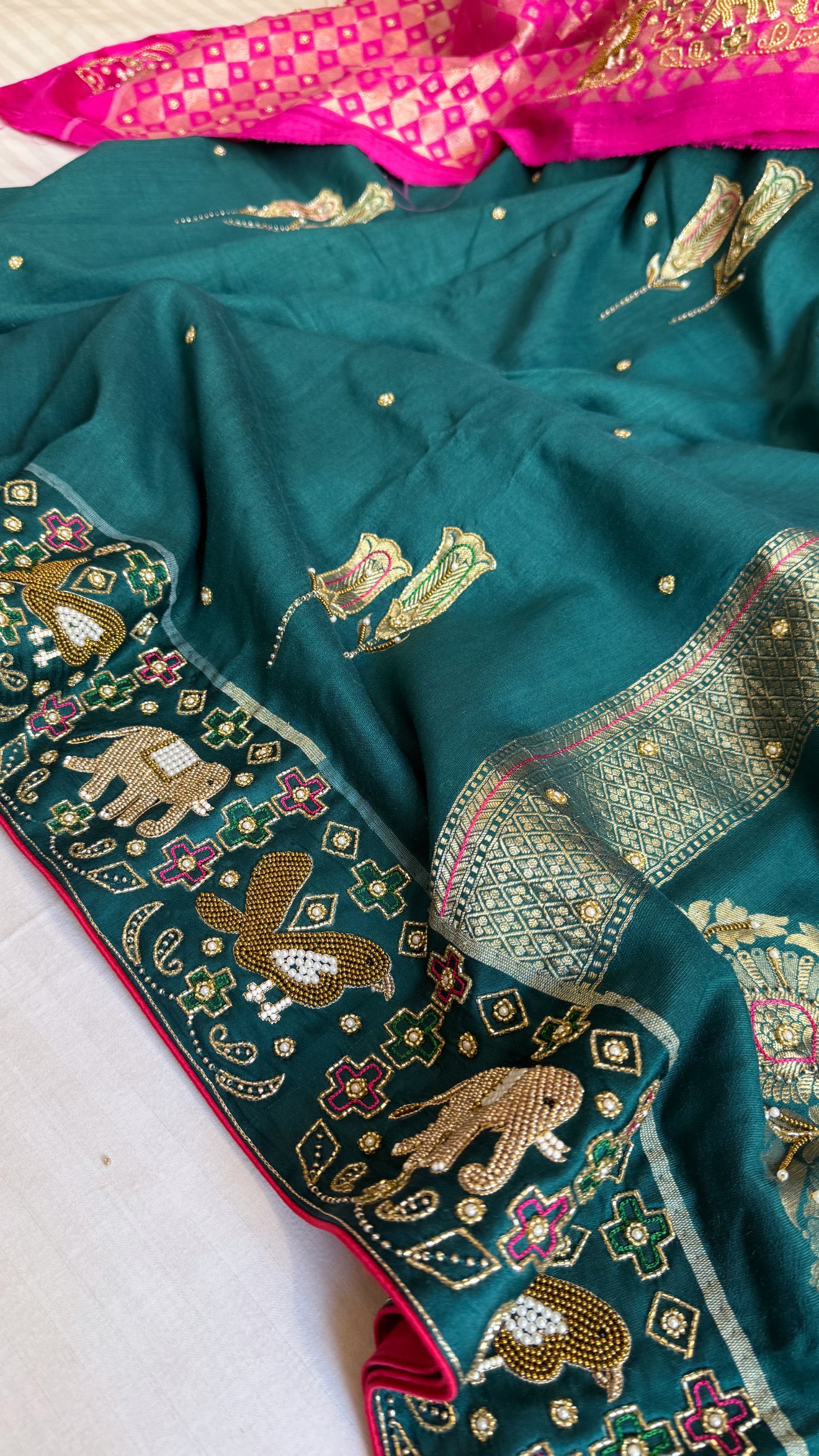 Moonga silk ikkat patola weaving inspired hand embroidered kadhwa saree