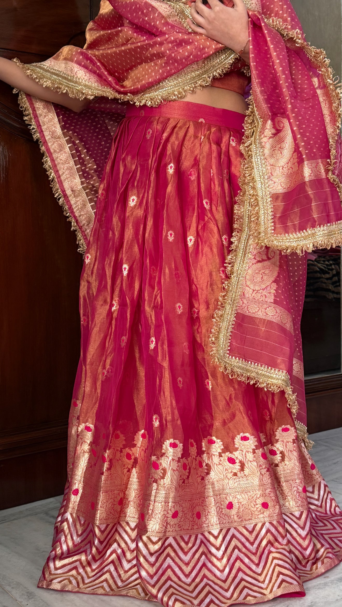 “Kali wala lahenga” — Rani pink semi stitched banarasi tissue silk lehenga set