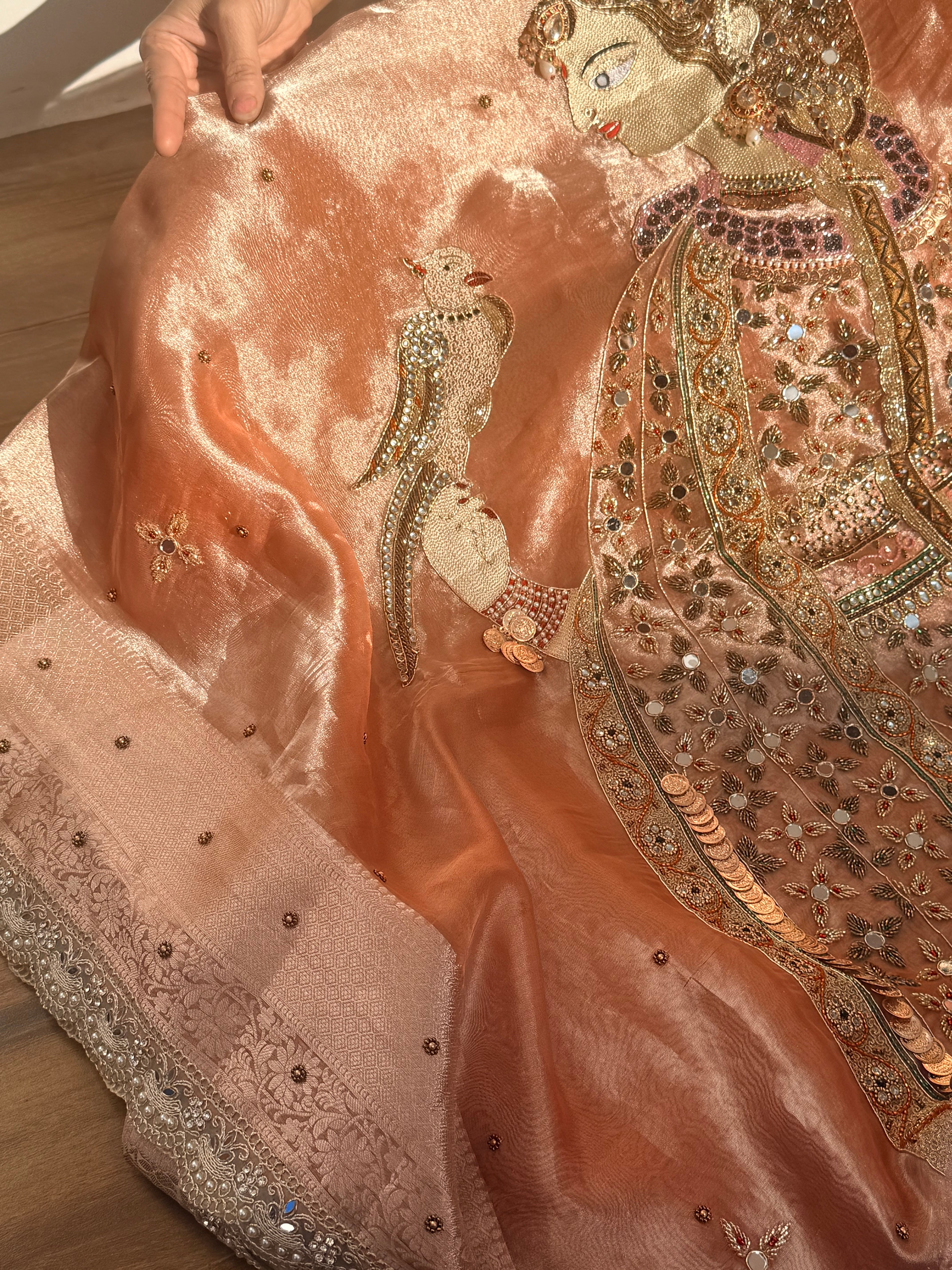 Heer saree with jadau necklace work hand embroidered tissue silk gajri peach saree