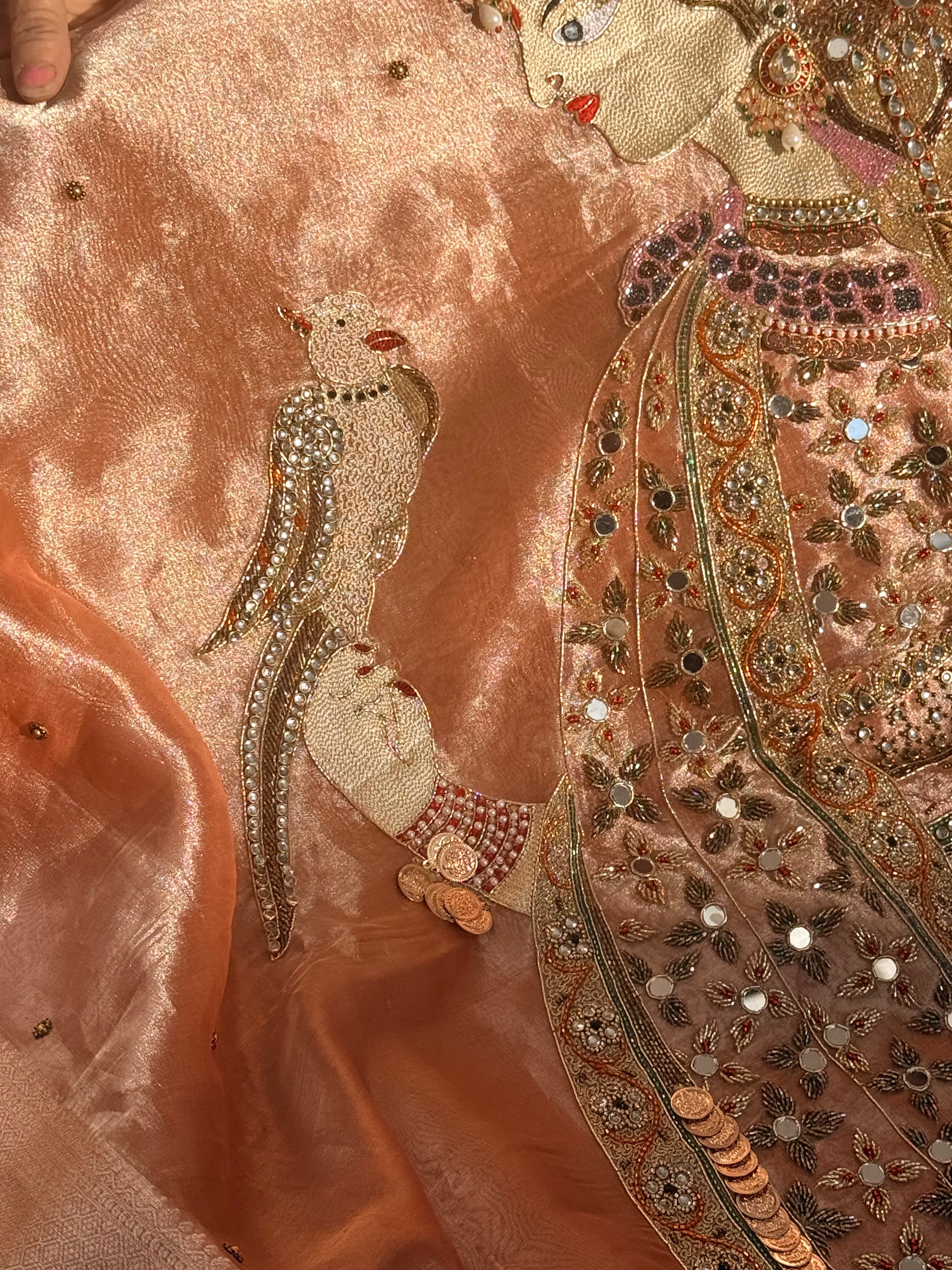 Heer saree with jadau necklace work hand embroidered tissue silk gajri peach saree