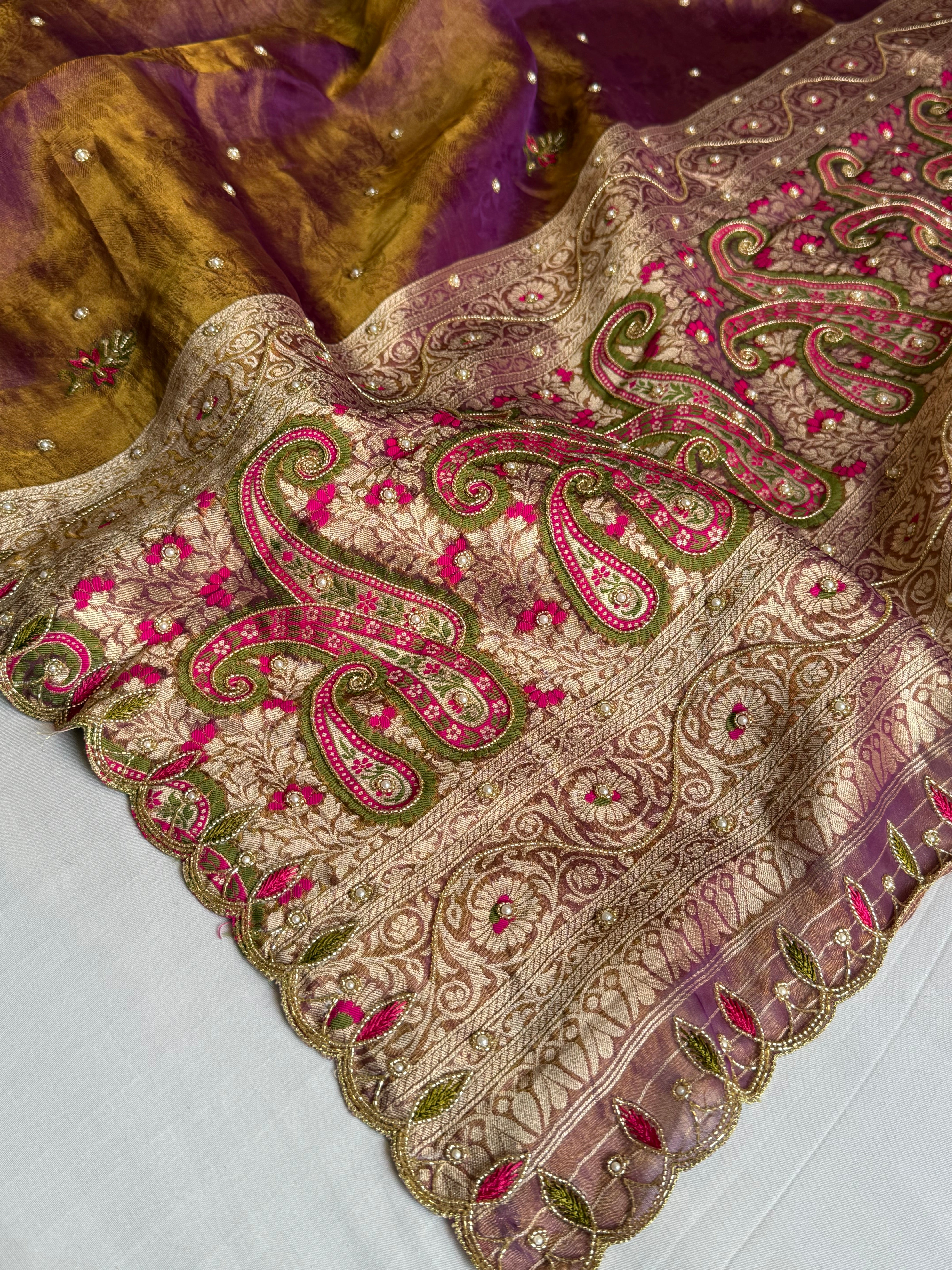 Copperish purple dhup chao effect tissue tanchoi jamevar meenakari pallu hand embroidered saree
