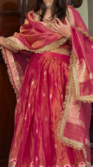 “Kali wala lahenga” — Rani pink semi stitched banarasi tissue silk lehenga set