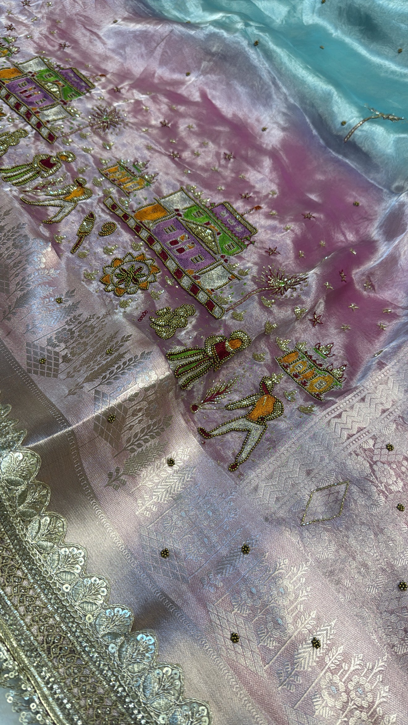 Blush pink-blue ombre shaded tissue silk hand embroidered saree