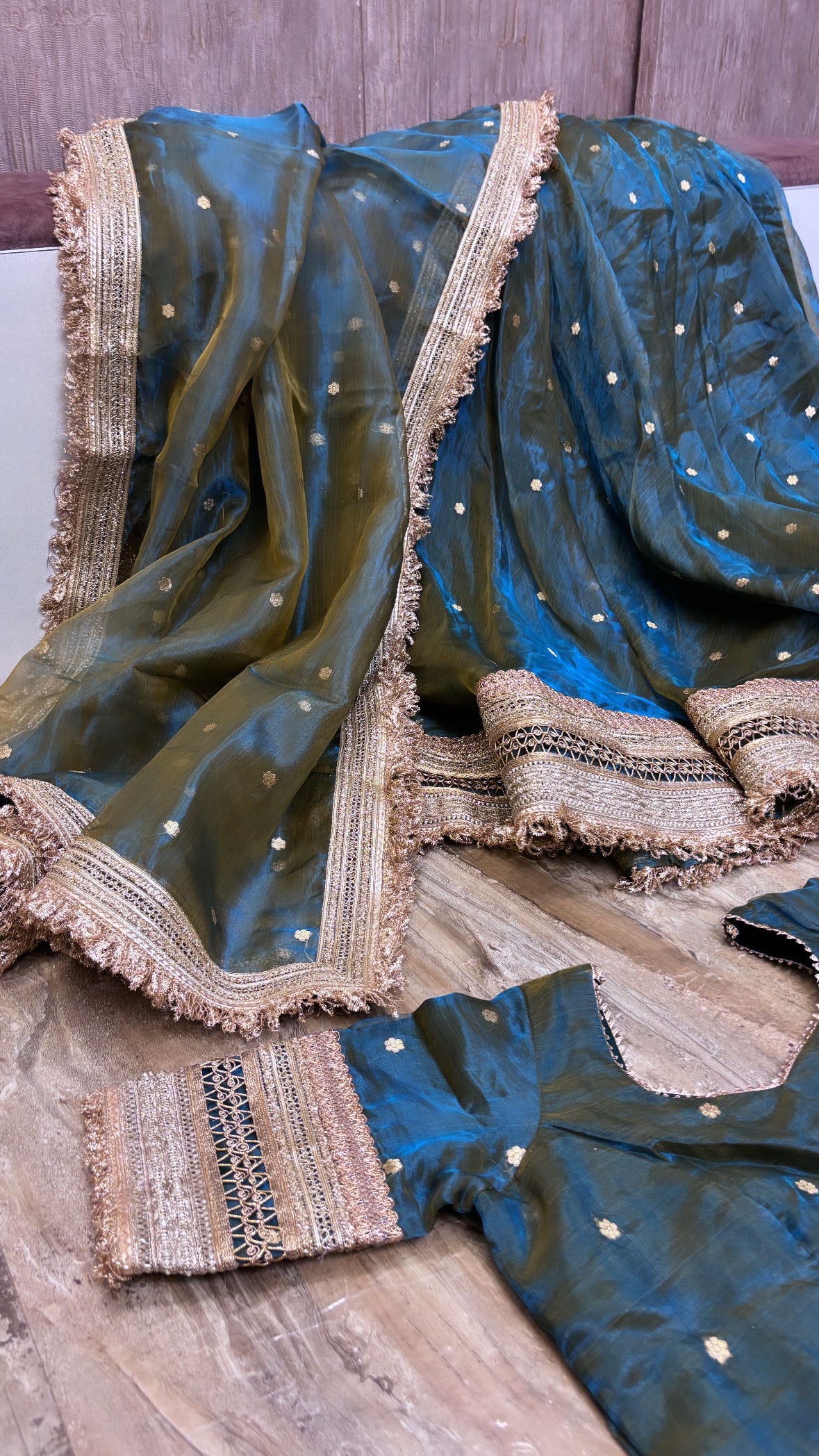 Mastani coral blue-olive tissue silk kadhwa buti dhup chao effect lehenga set