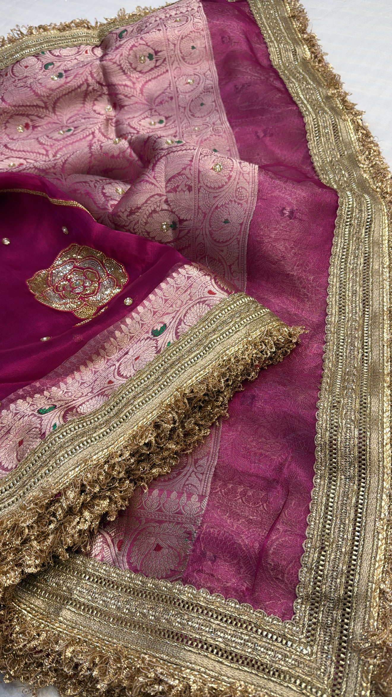 Cranberry pink tissue silk heavy hand embroidered kadhwa saree