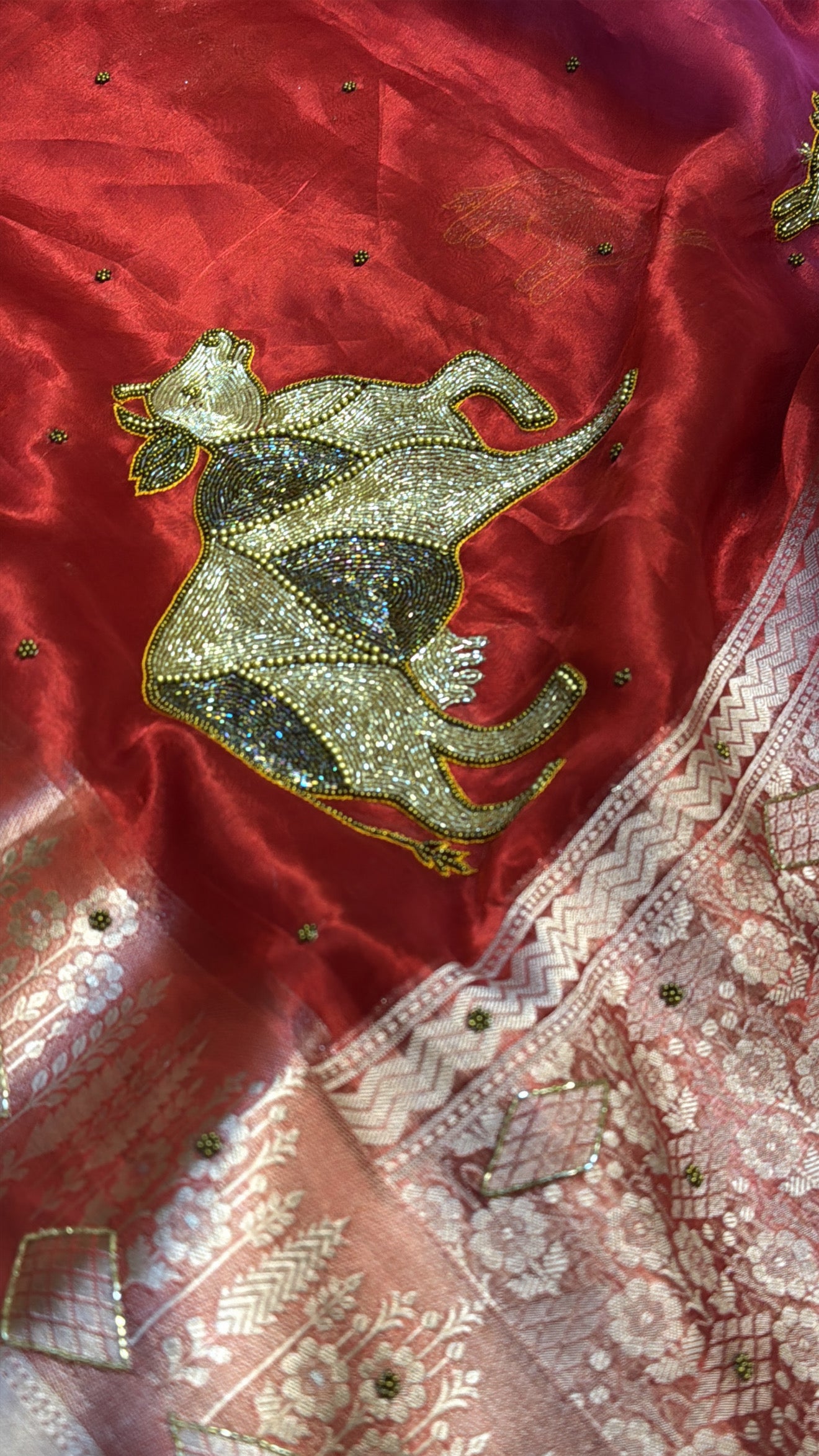 Dulhan ka joda husn red tissue silk hand embroidered saree