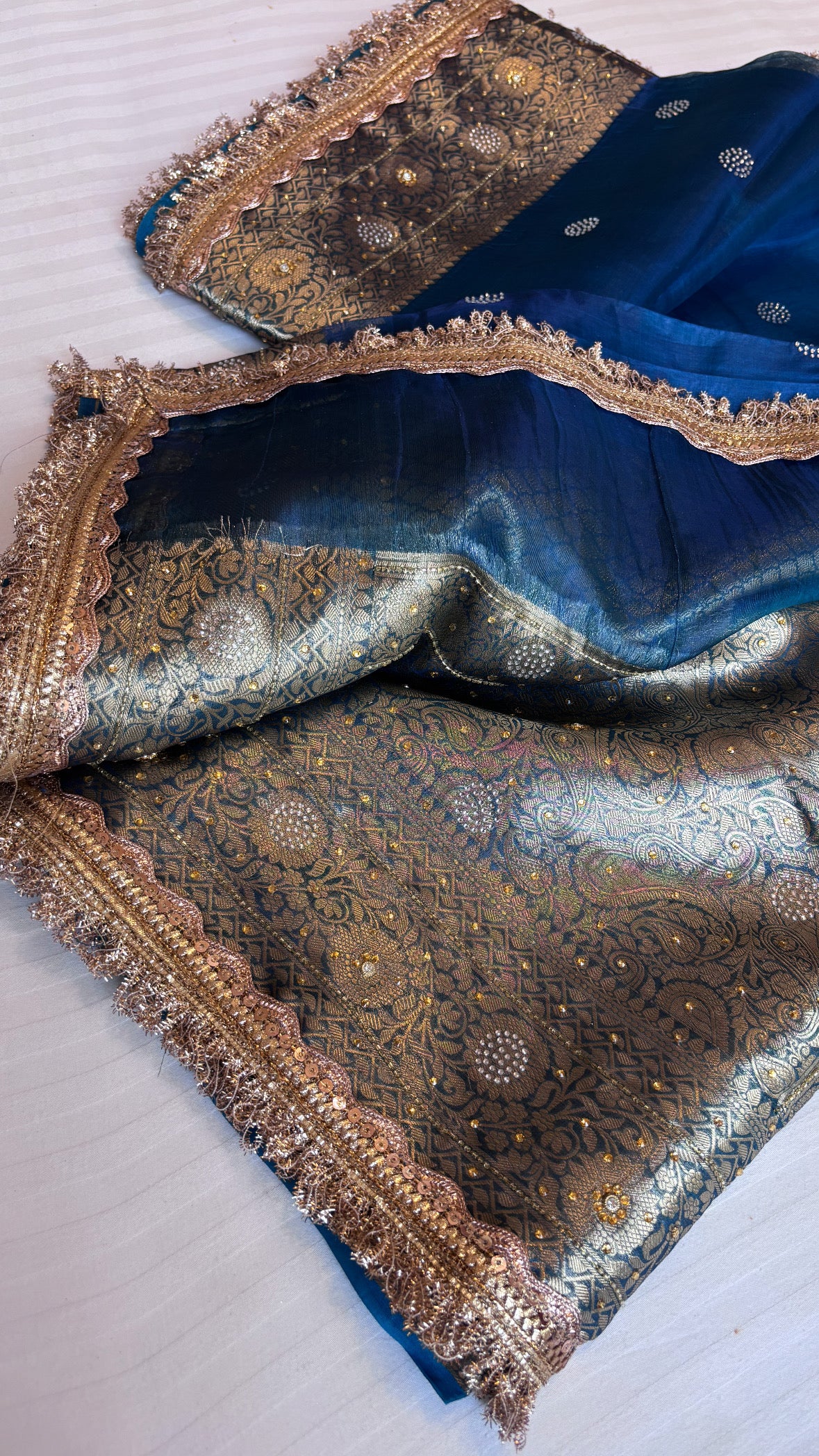 Sitara aqua blue tissue silk stonework saree