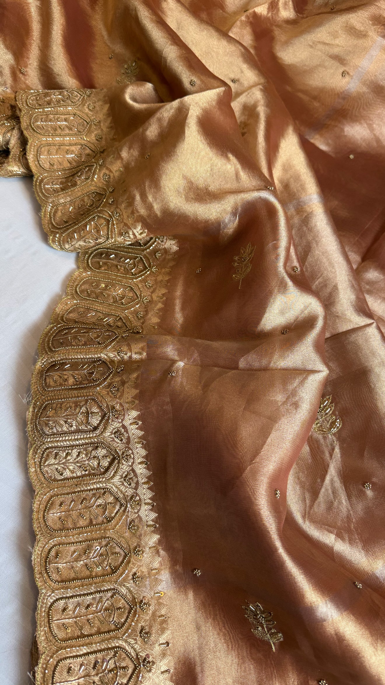 Husn kanjivaram peach tissue silk heavy hand embroidered saree