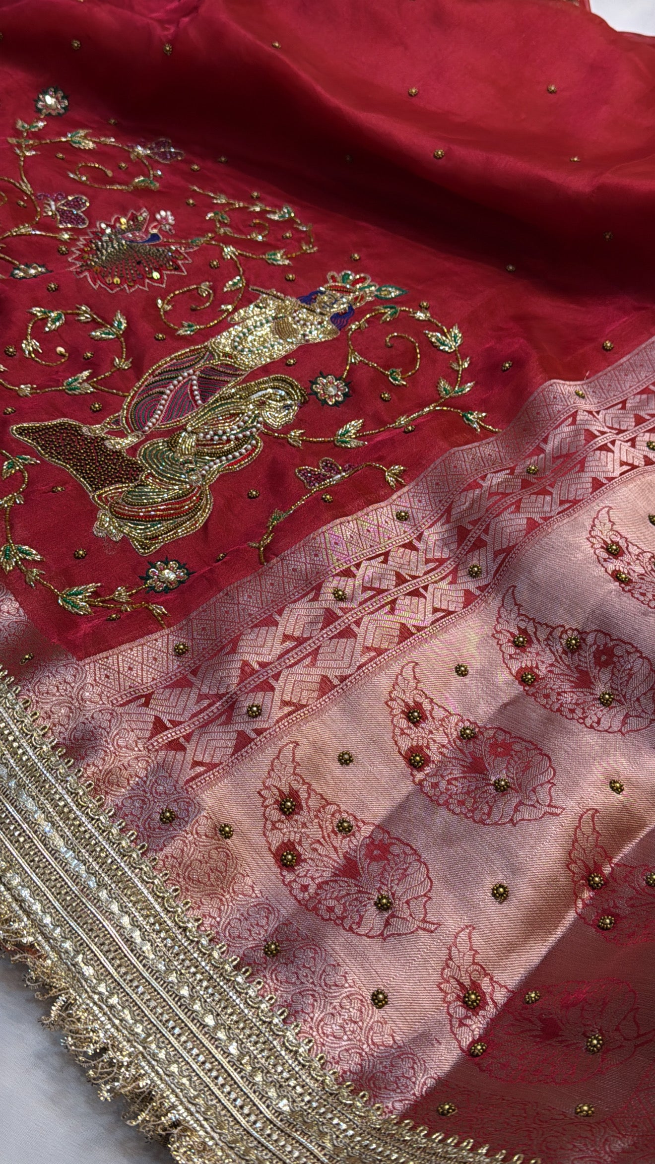 Dulhan ka joda husn red tissue silk hand embroidered kadhwa saree