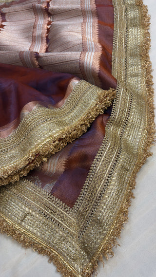 Maharani metallic maroonish-purple dhup chao effect tissue silk saree