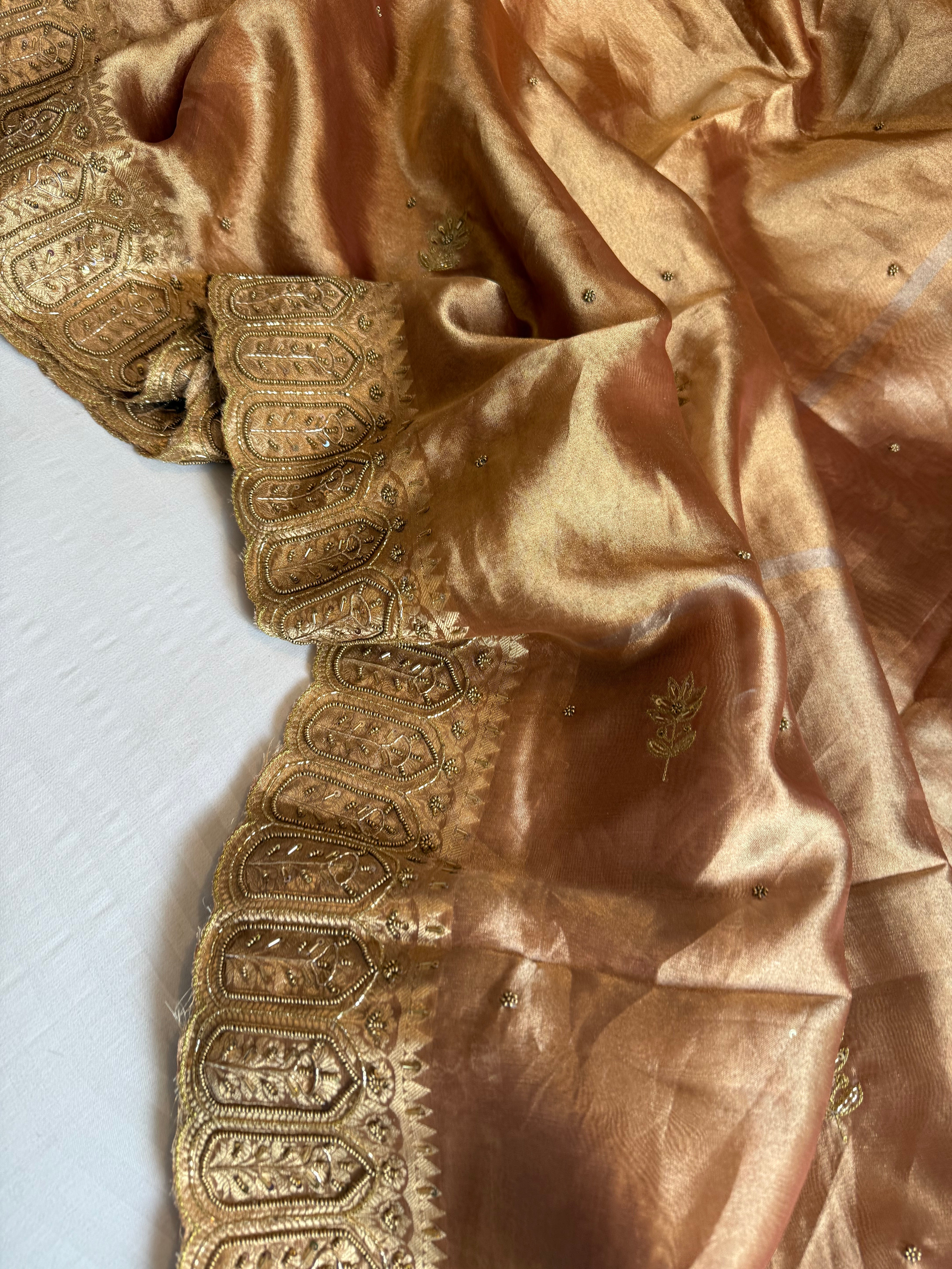 Husn kanjivaram peach tissue silk heavy hand embroidered saree