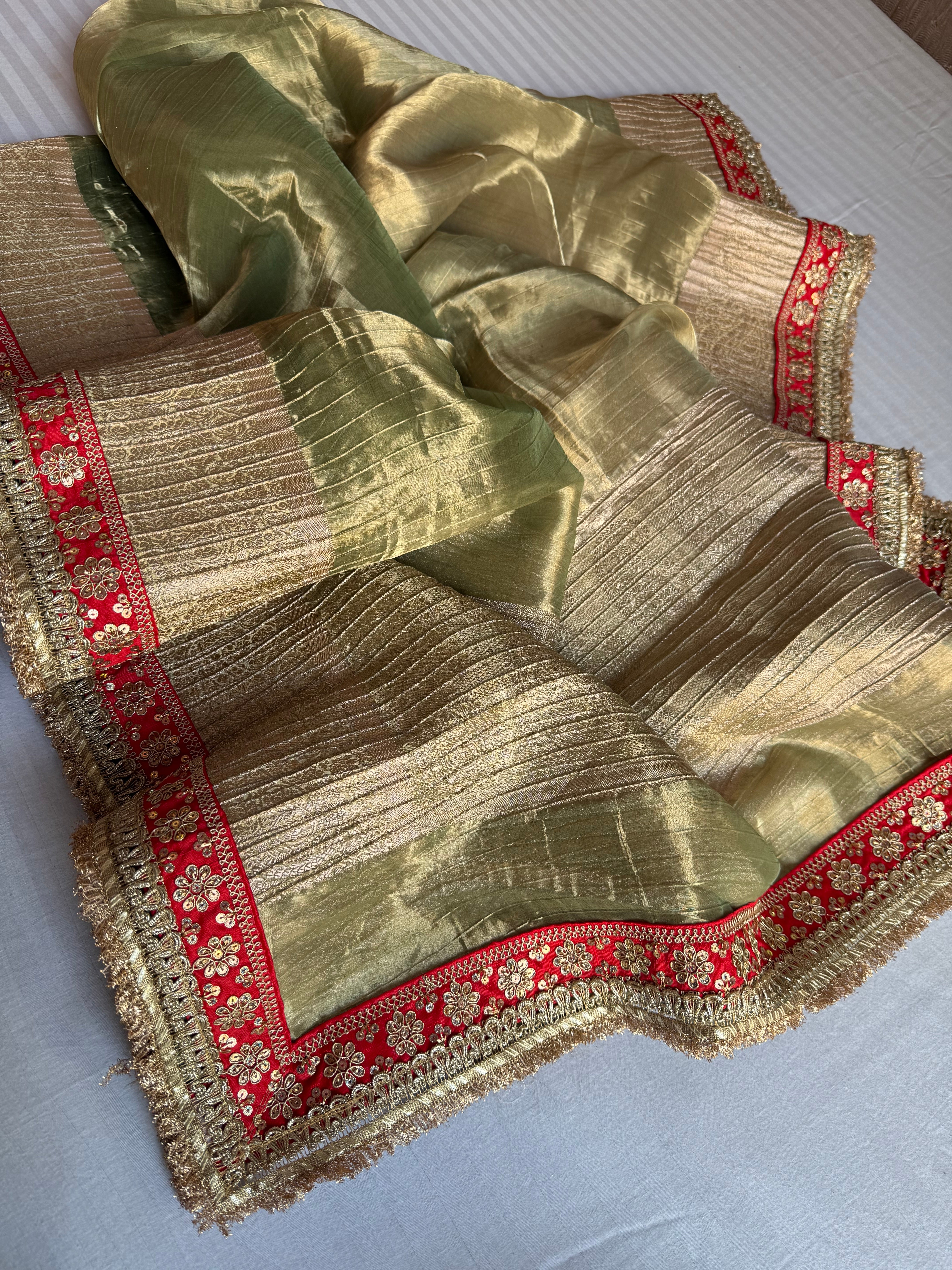 Mint green pleated maharani tissue silk kadhwa saree