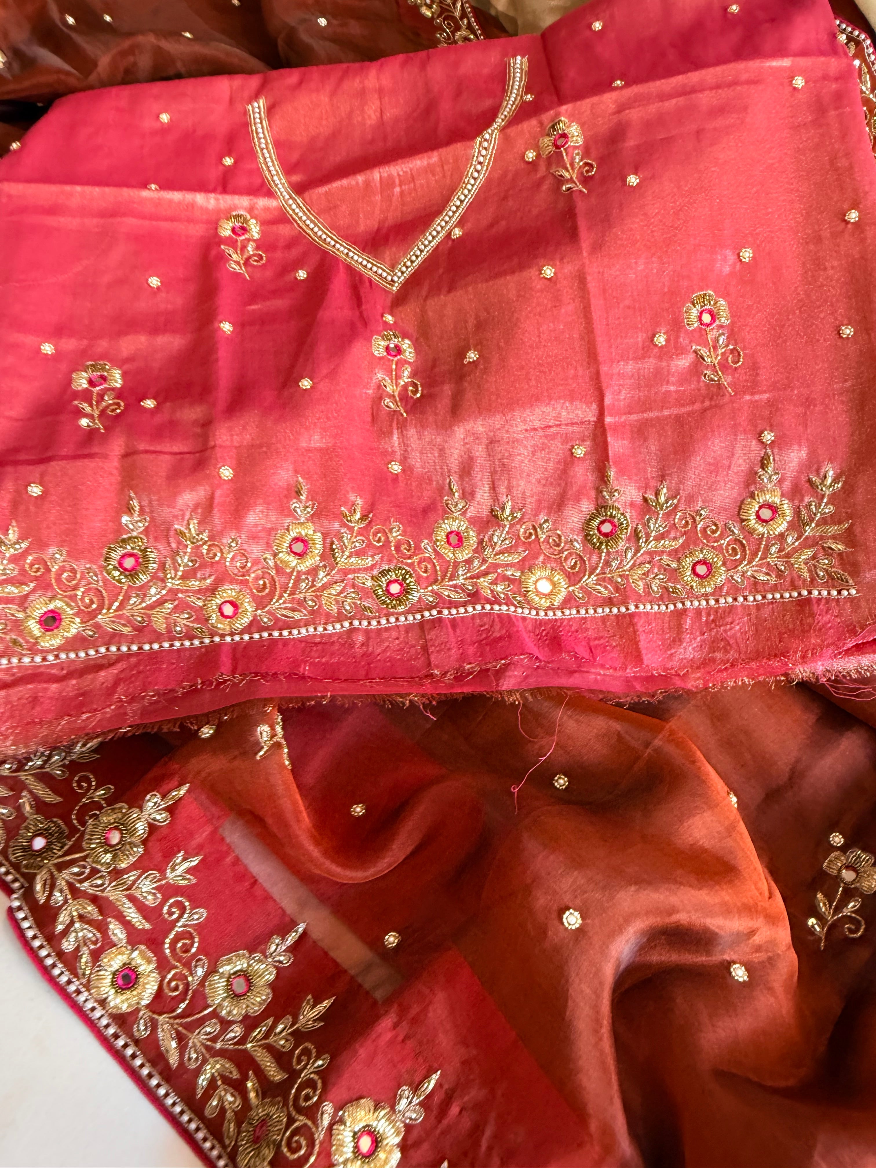 Mud brown-rani pink combination mirror and zardozi work tissue silk saree