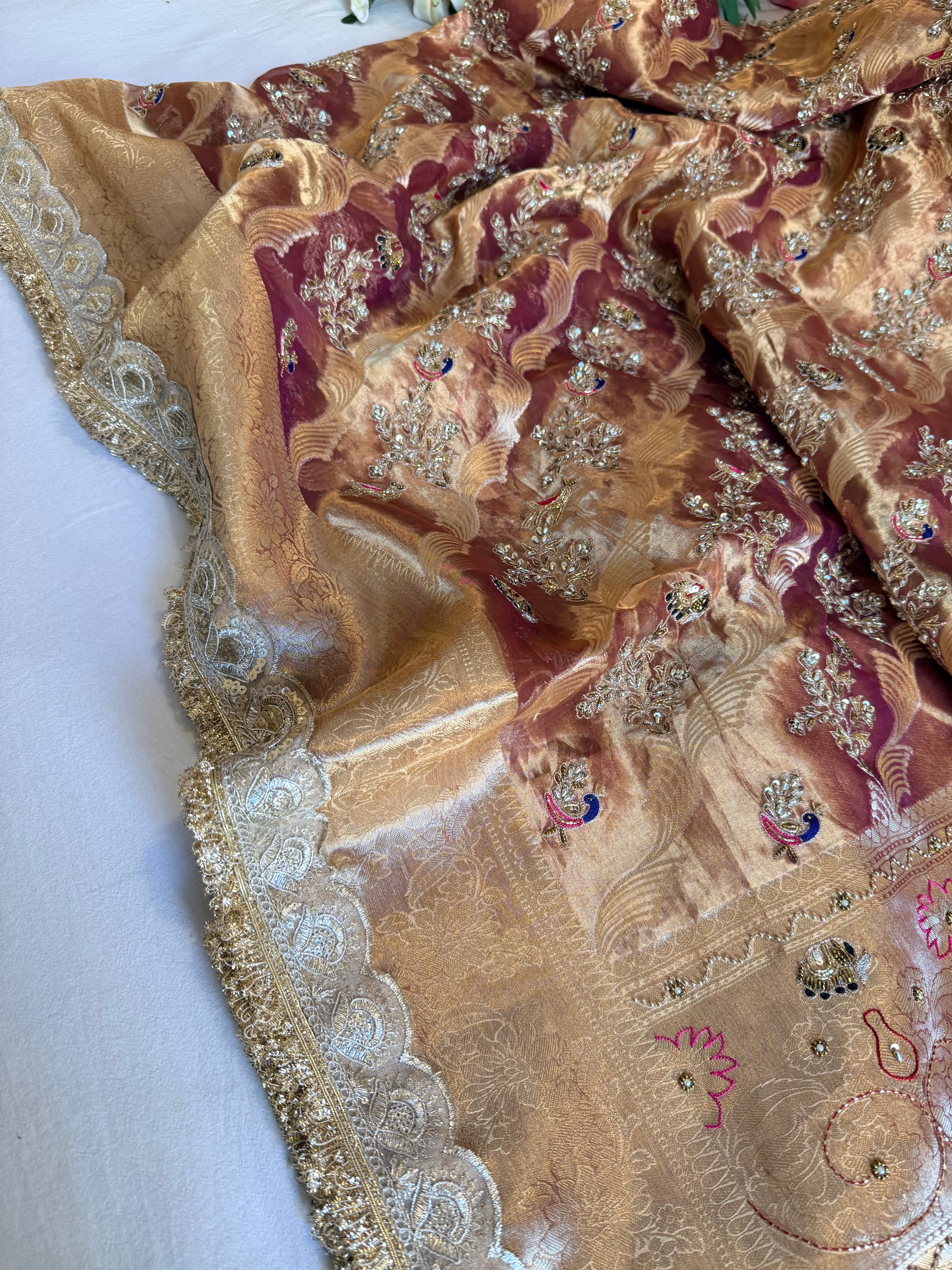 Copperish purple tissue silk hand embroidered shikargah work saree