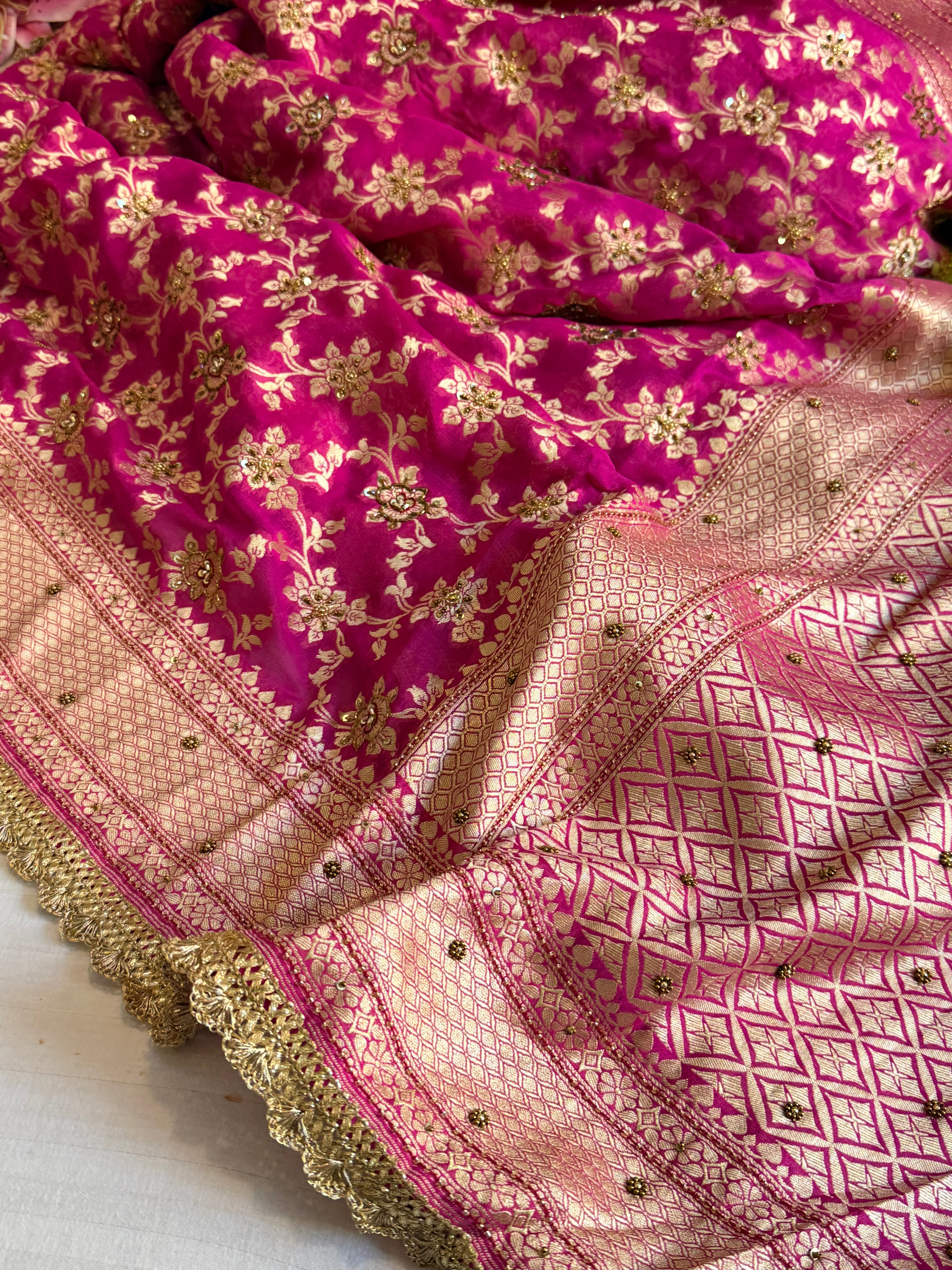 Banarasi chiffon gorgette rani pink hand embroidered kadhwa saree